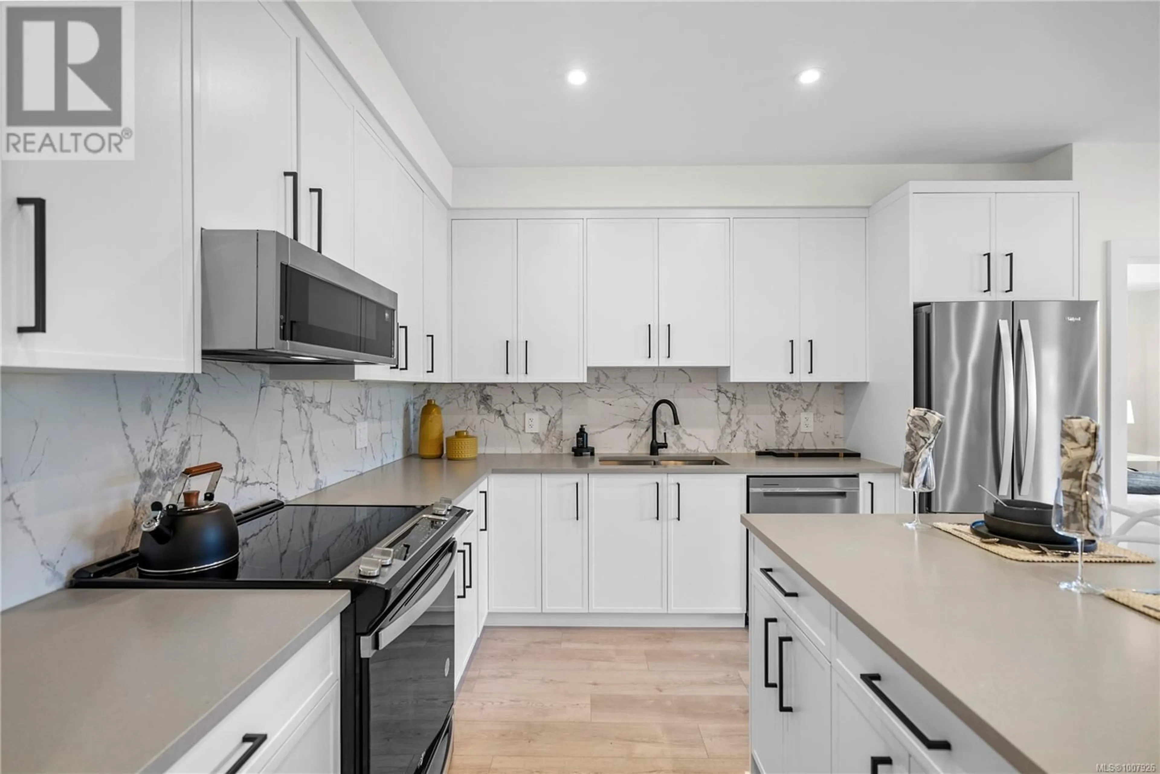 Open concept kitchen, ceramic/tile floor for 508 - 1371 GOLDSTREAM AVENUE, Langford British Columbia V9B7B4