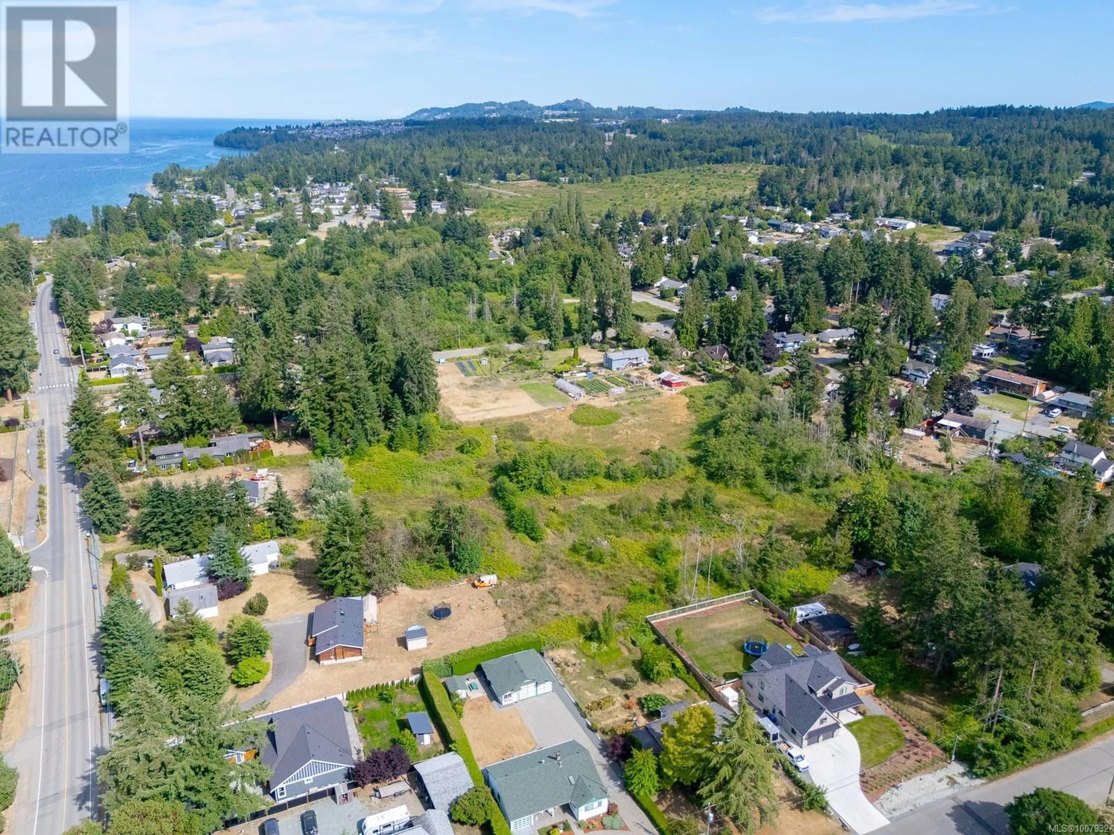 A pic from outside/outdoor area/front of a property/back of a property/a pic from drone, water/lake/river/ocean view for 7405/7425 LANTZVILLE ROAD, Lantzville British Columbia V0R2H0