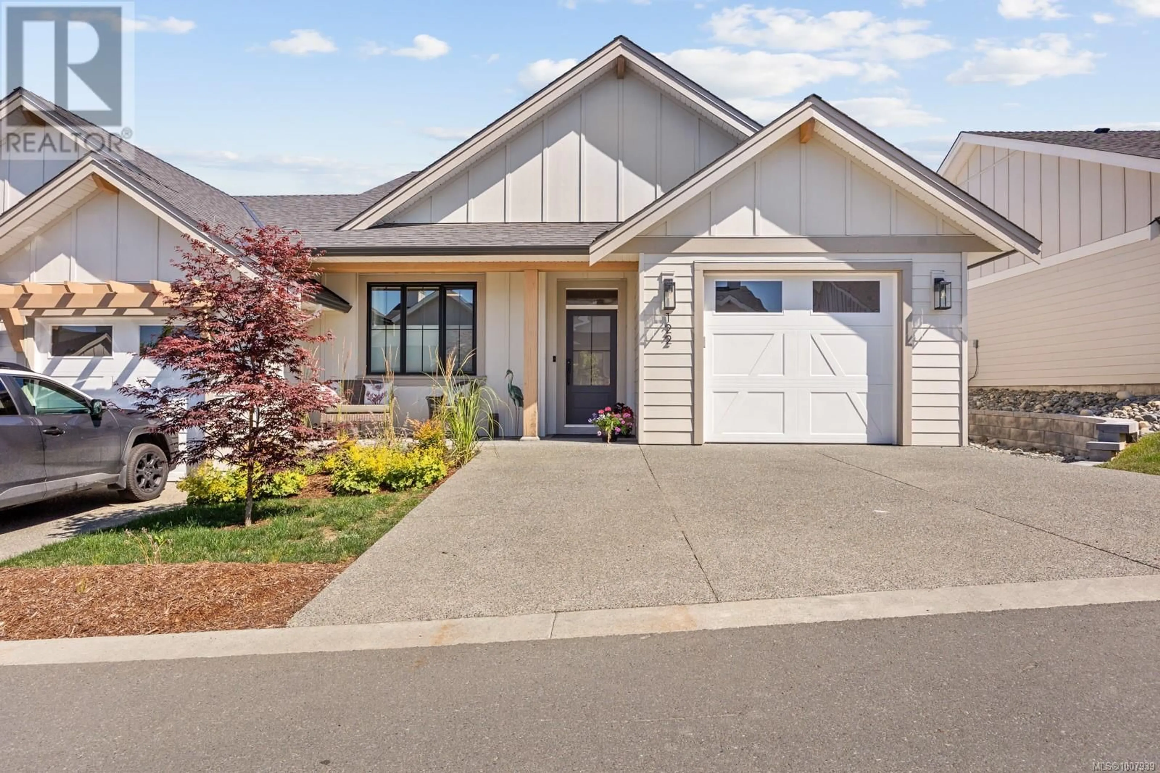 Home with vinyl exterior material, street for 122 - 4098 BUCKSTONE ROAD, Courtenay British Columbia V9N0H2