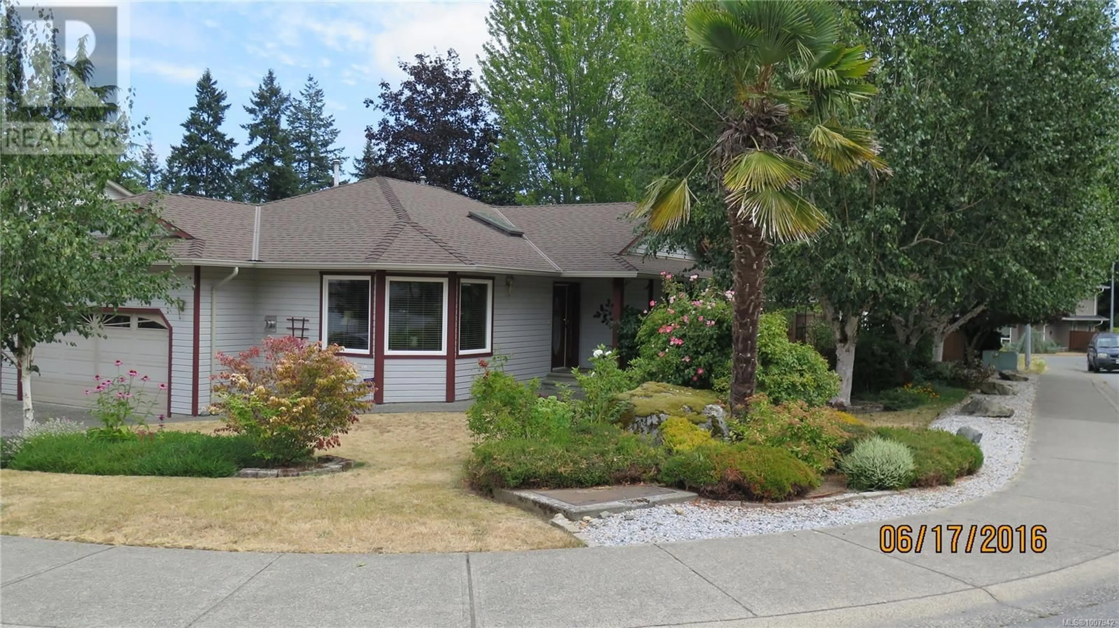 Home with vinyl exterior material, street for 1205 MCKINLEY ROAD, Ladysmith British Columbia V9G1A9