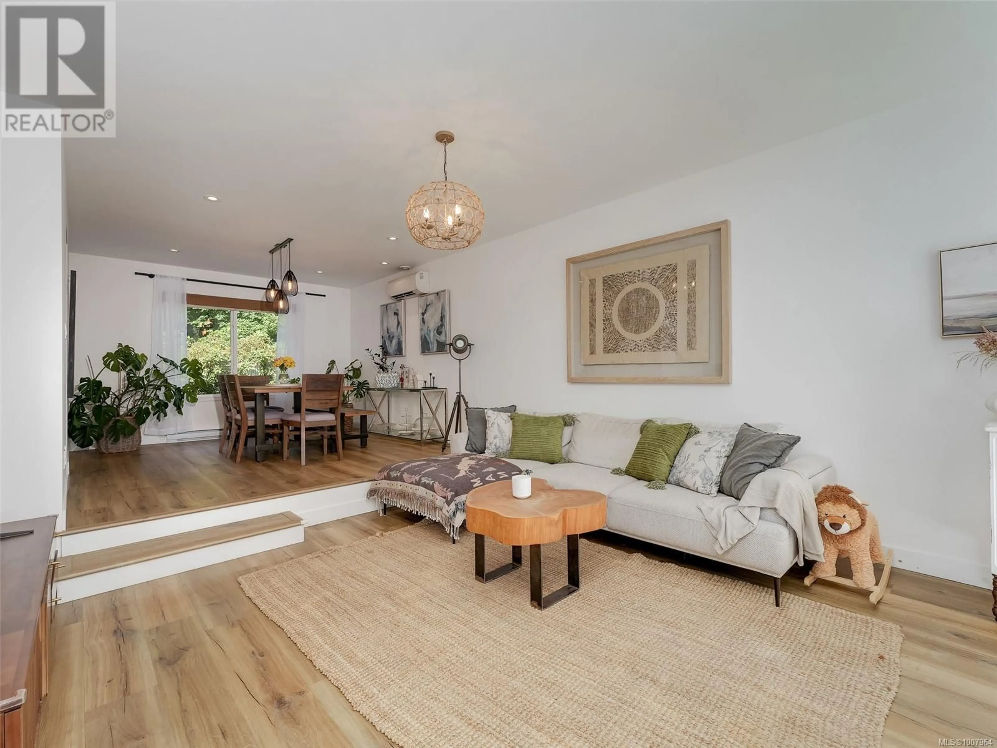 Living room with furniture, wood/laminate floor for 2146 HENLYN DRIVE, Sooke British Columbia V9Z0N5