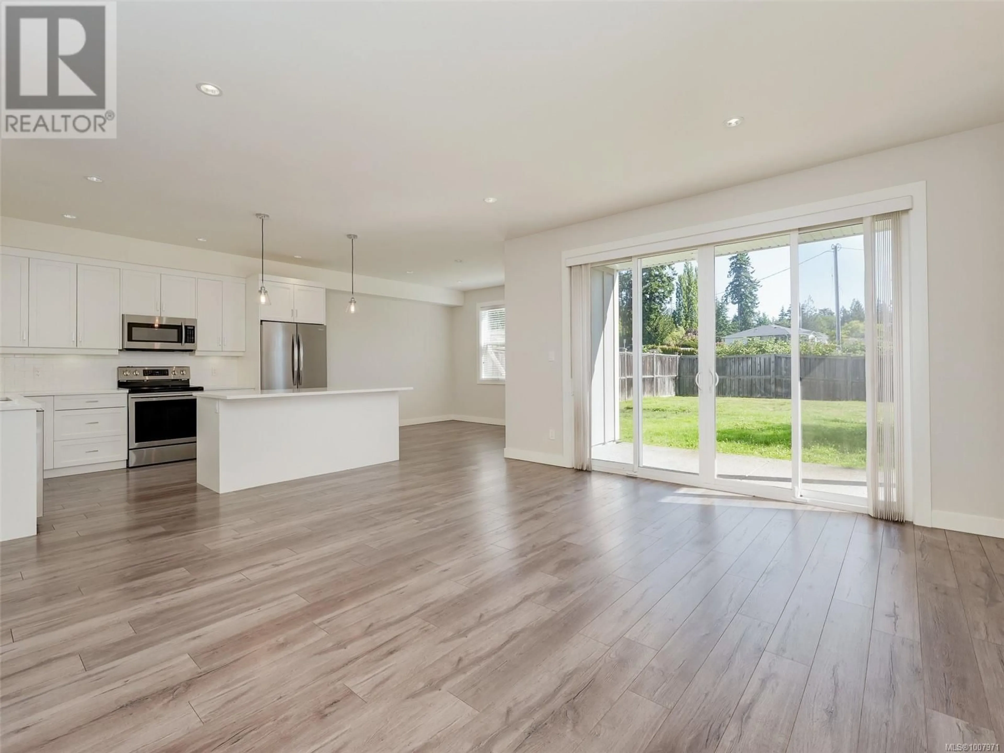 Open concept kitchen, wood/laminate floor for 2151 WINFIELD DRIVE, Sooke British Columbia V9Z1P1