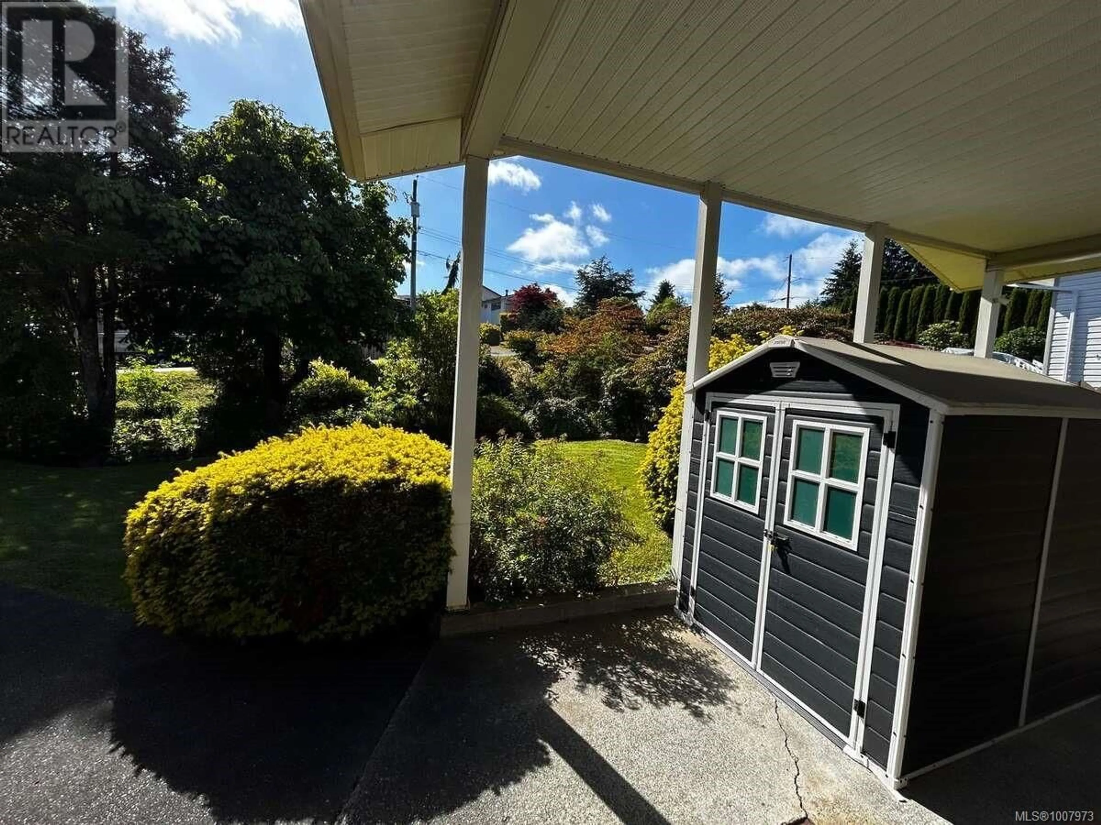 A pic from outside/outdoor area/front of a property/back of a property/a pic from drone, street for 6965 NAHWITTI AVENUE, Port Hardy British Columbia V0N2P0