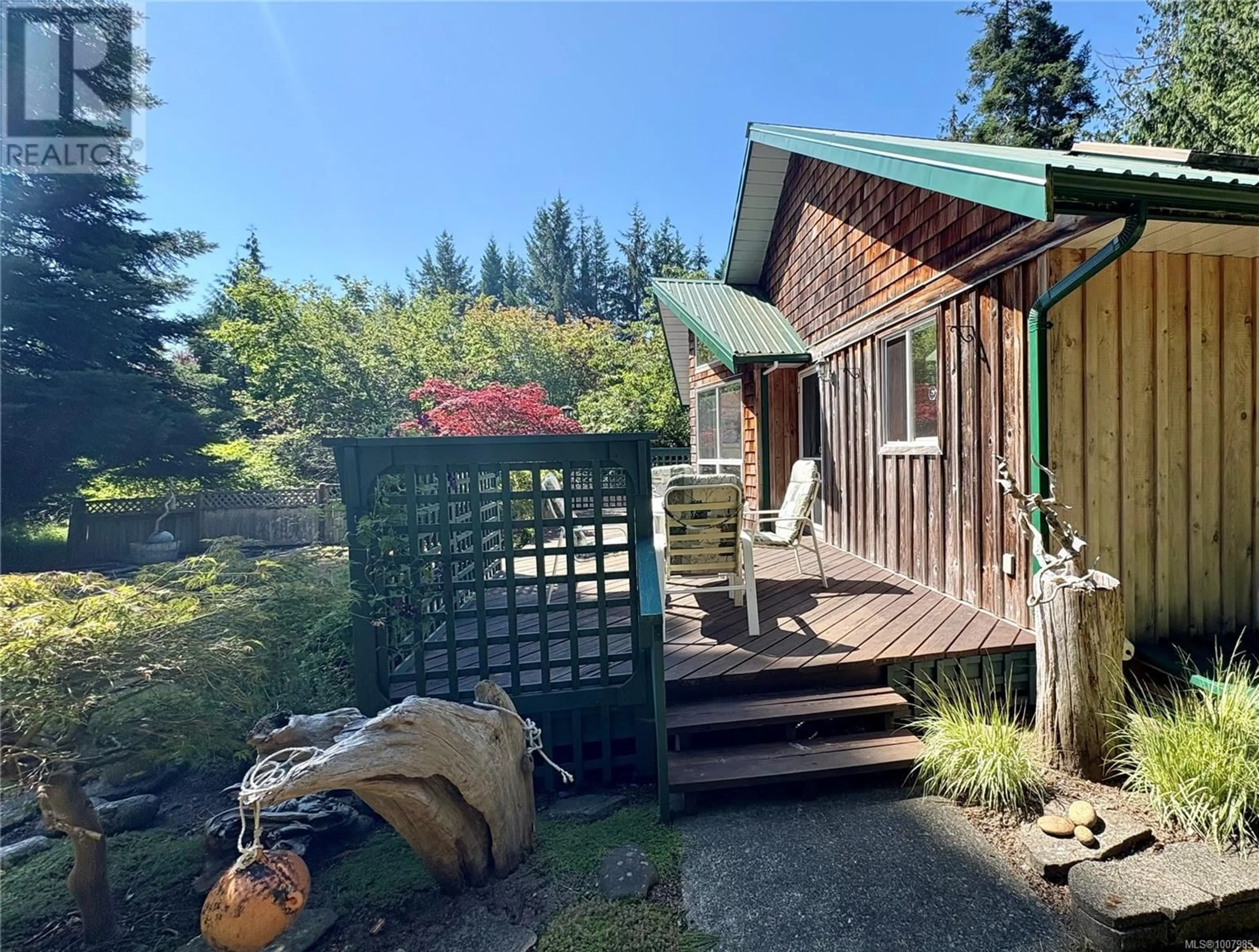 A pic from outside/outdoor area/front of a property/back of a property/a pic from drone, mountain view for 1655 BAIKIE ROAD, Denman Island British Columbia V0R1T0