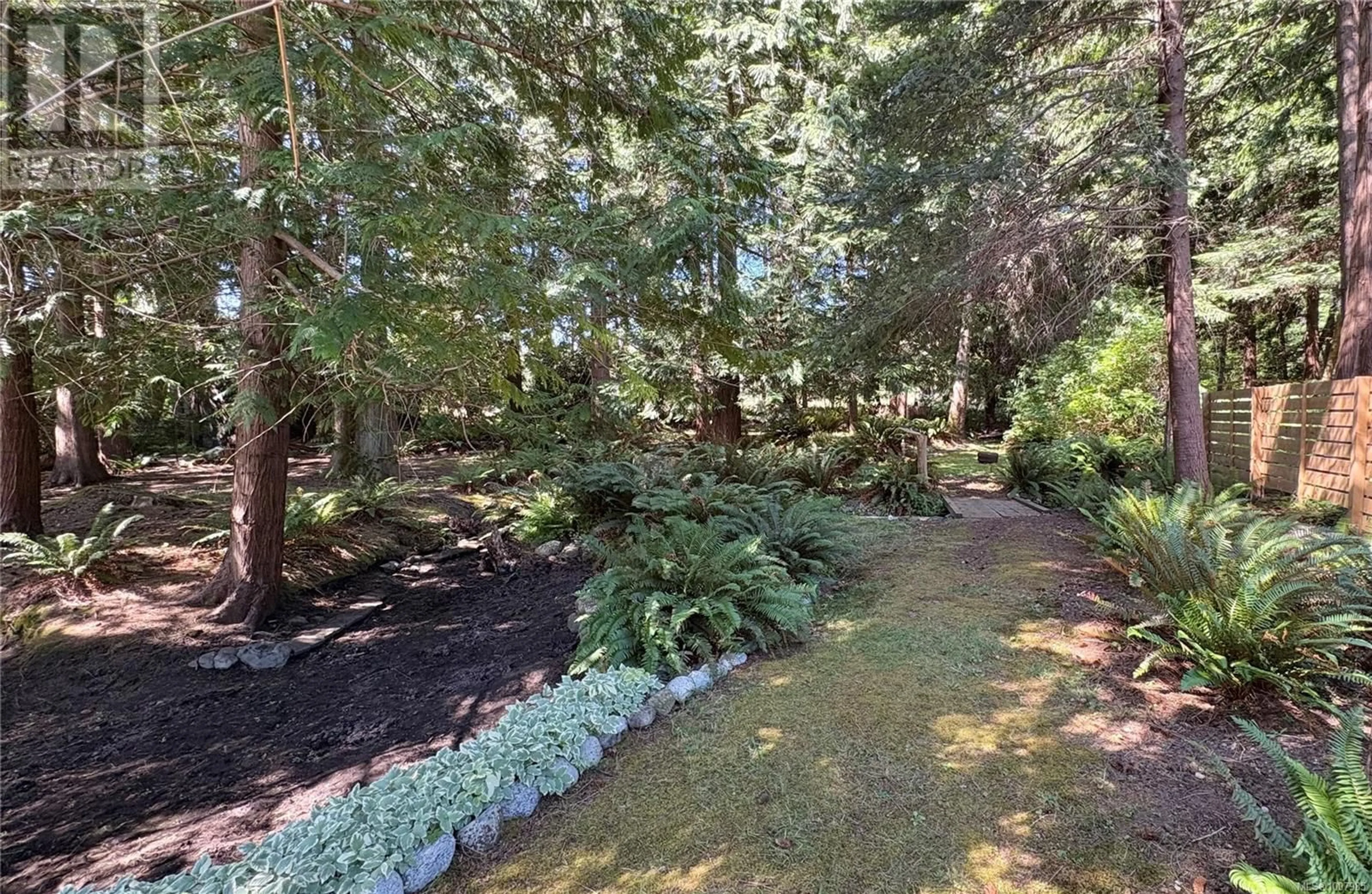 Patio, forest/trees view for 1655 BAIKIE ROAD, Denman Island British Columbia V0R1T0
