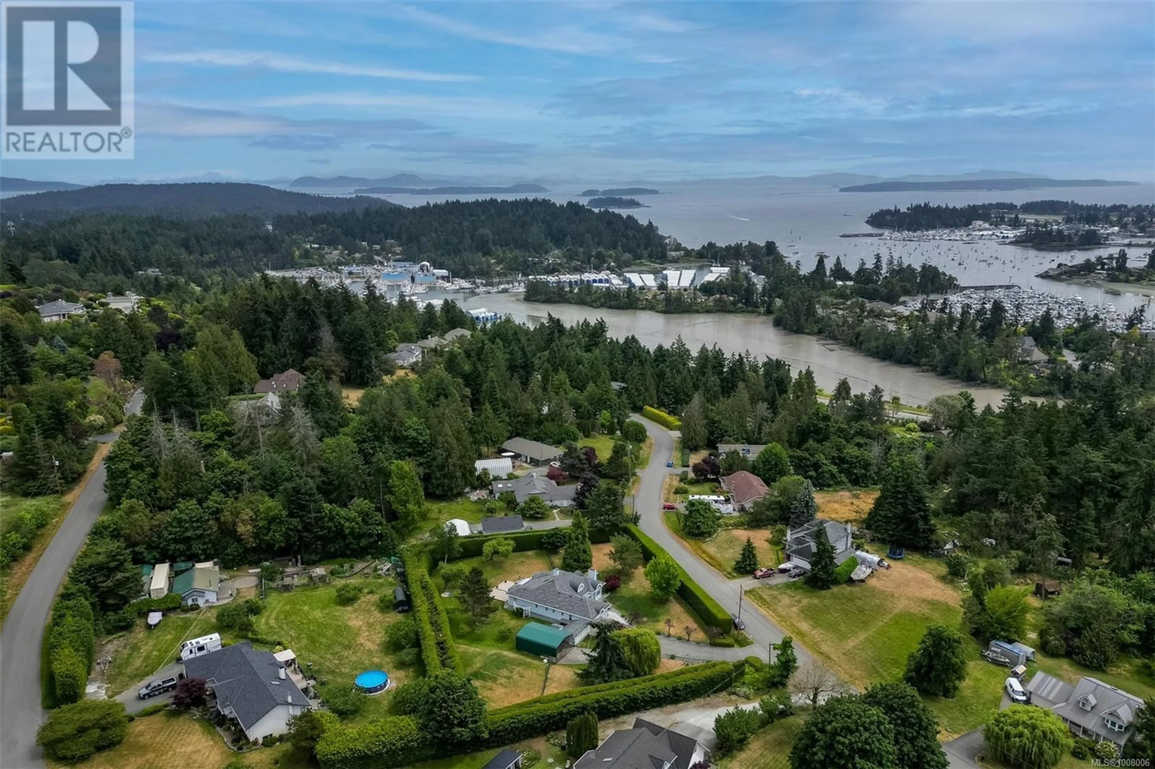A pic from outside/outdoor area/front of a property/back of a property/a pic from drone, water/lake/river/ocean view for 10978 CEDAR LANE, North Saanich British Columbia V8L5R1