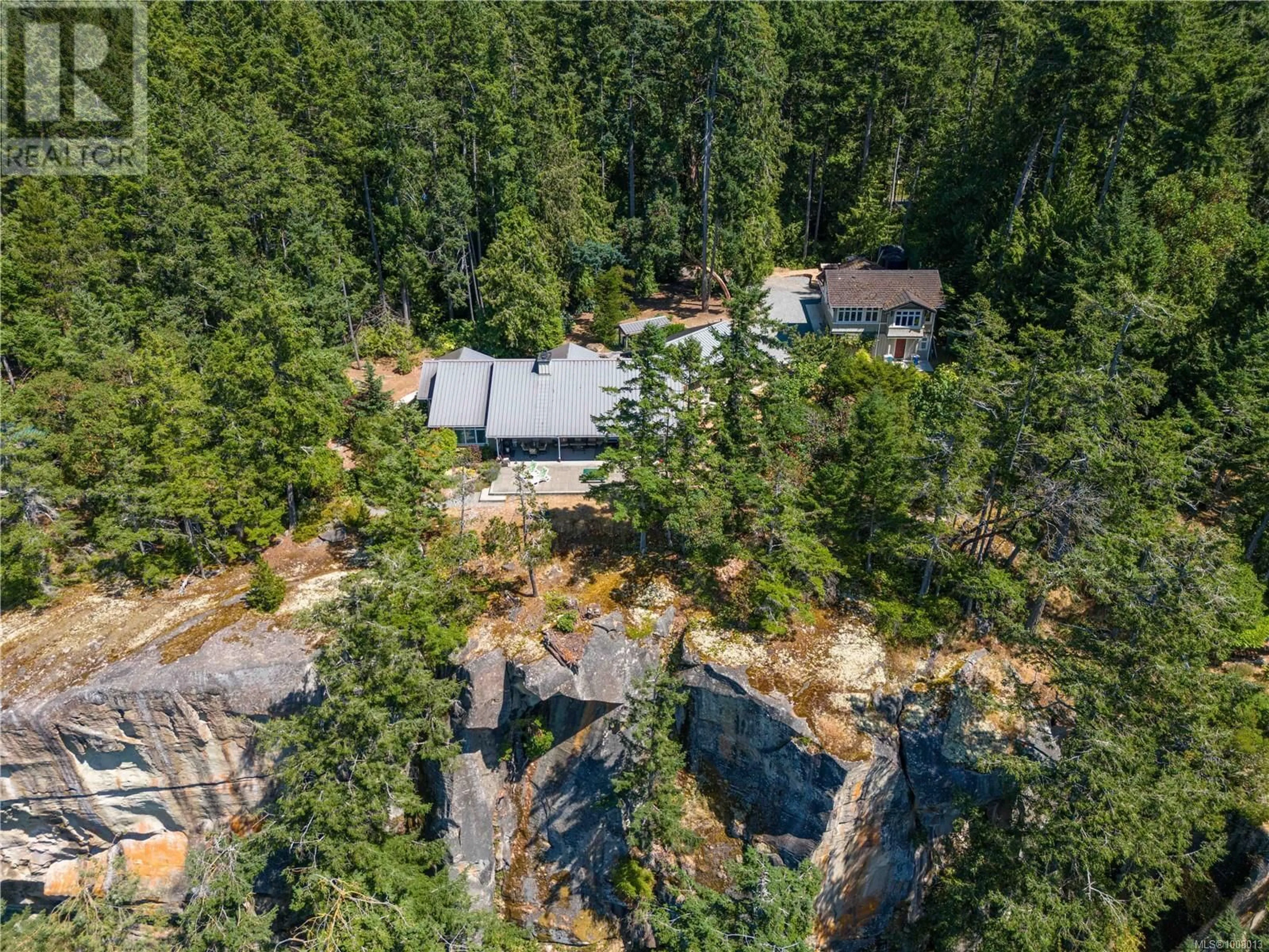 A pic from outside/outdoor area/front of a property/back of a property/a pic from drone, forest/trees view for 879 CANSO ROAD, Gabriola Island British Columbia V0R1X2
