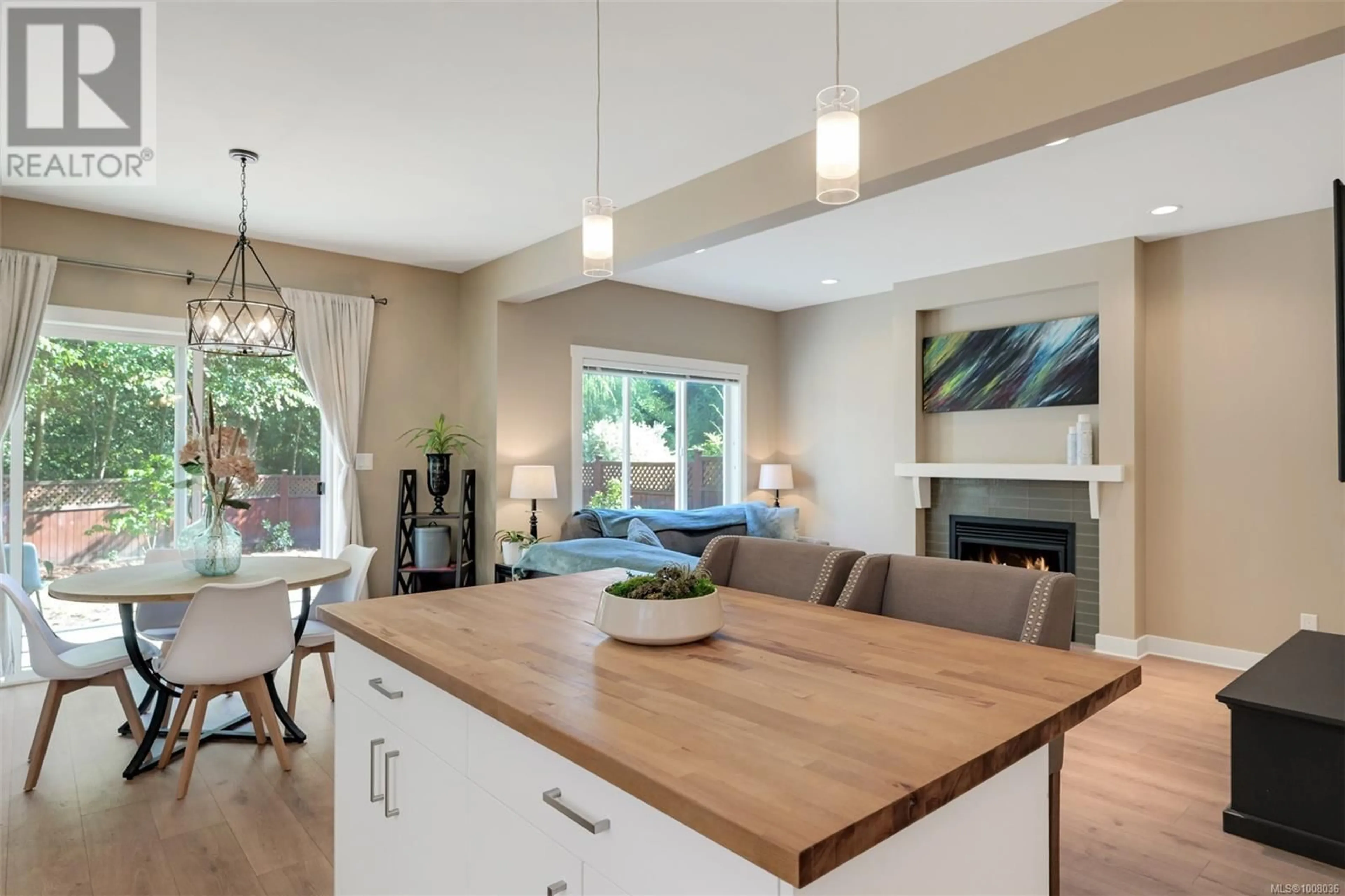 Open concept kitchen, wood/laminate floor for 1034 GALA COURT, Langford British Columbia V9C0J8