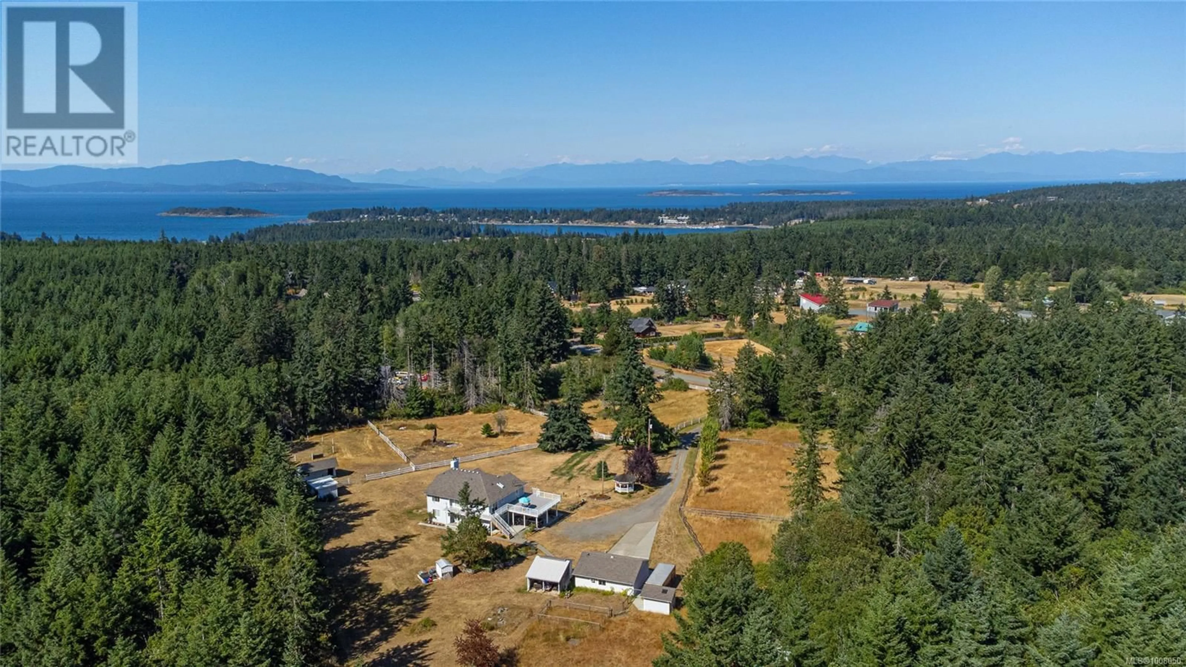 A pic from outside/outdoor area/front of a property/back of a property/a pic from drone, water/lake/river/ocean view for 1980 SADDLE DRIVE, Nanoose Bay British Columbia V9P9C2