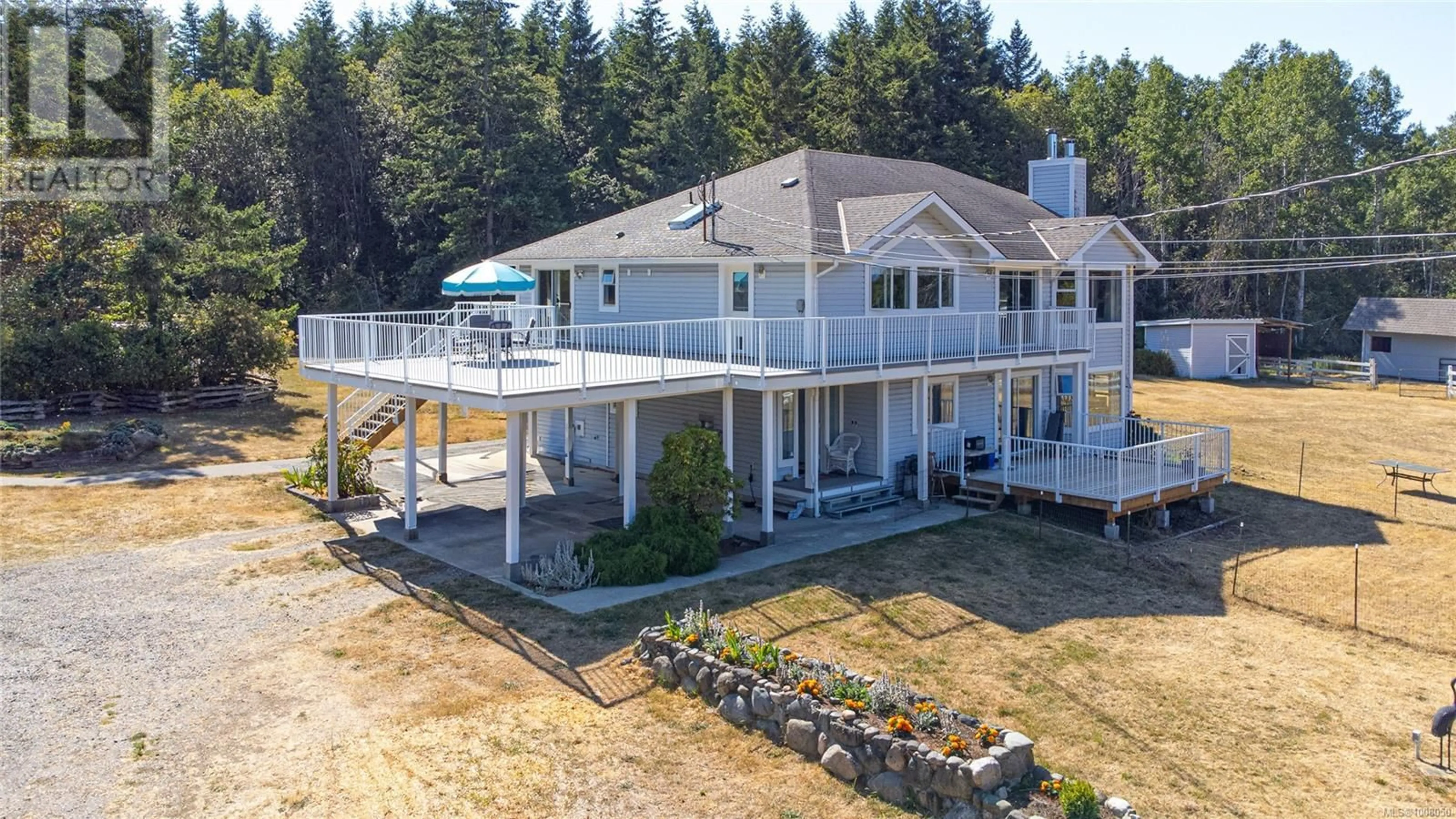 A pic from outside/outdoor area/front of a property/back of a property/a pic from drone, water/lake/river/ocean view for 1980 SADDLE DRIVE, Nanoose Bay British Columbia V9P9C2