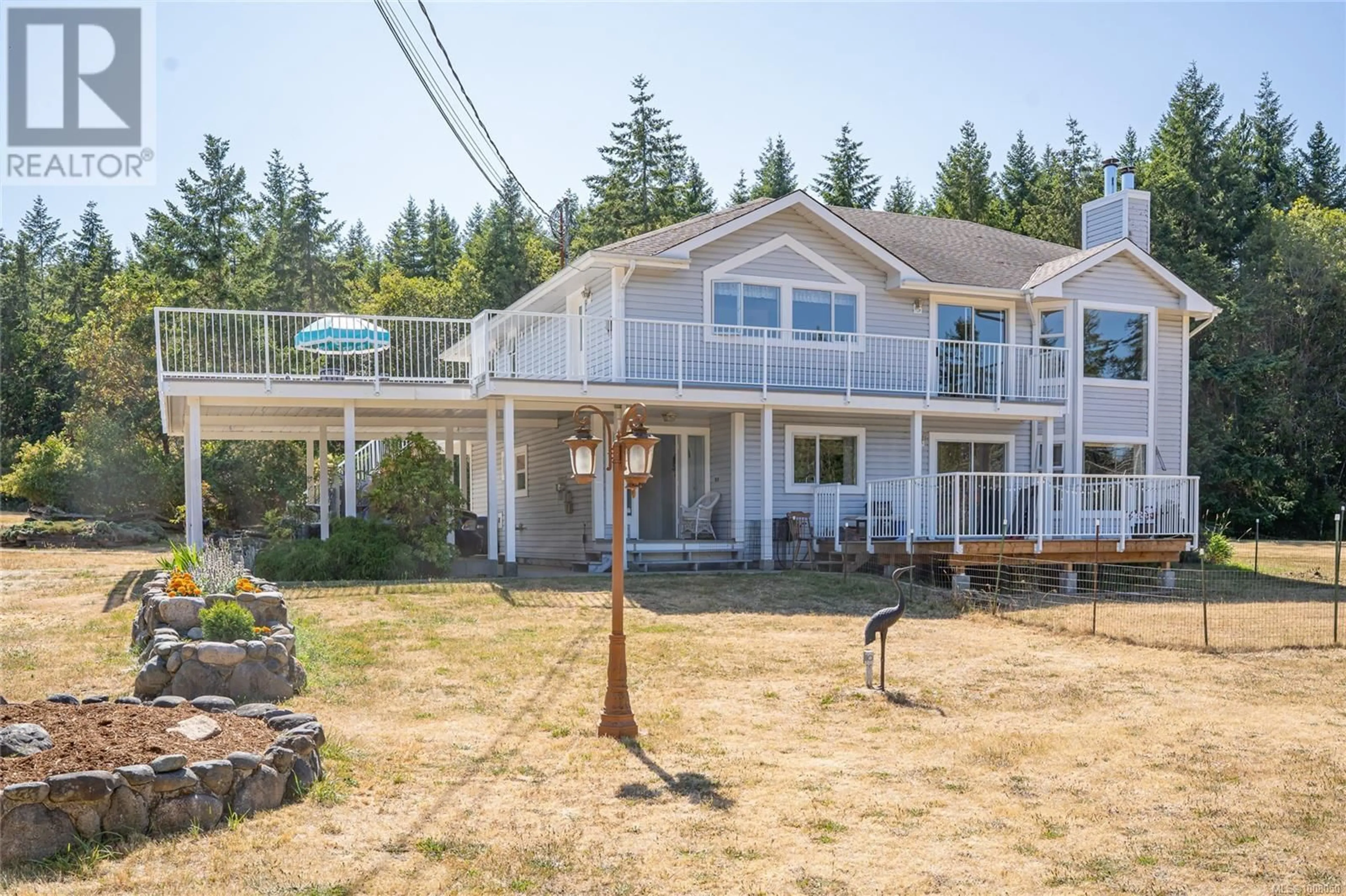 A pic from outside/outdoor area/front of a property/back of a property/a pic from drone, water/lake/river/ocean view for 1980 SADDLE DRIVE, Nanoose Bay British Columbia V9P9C2