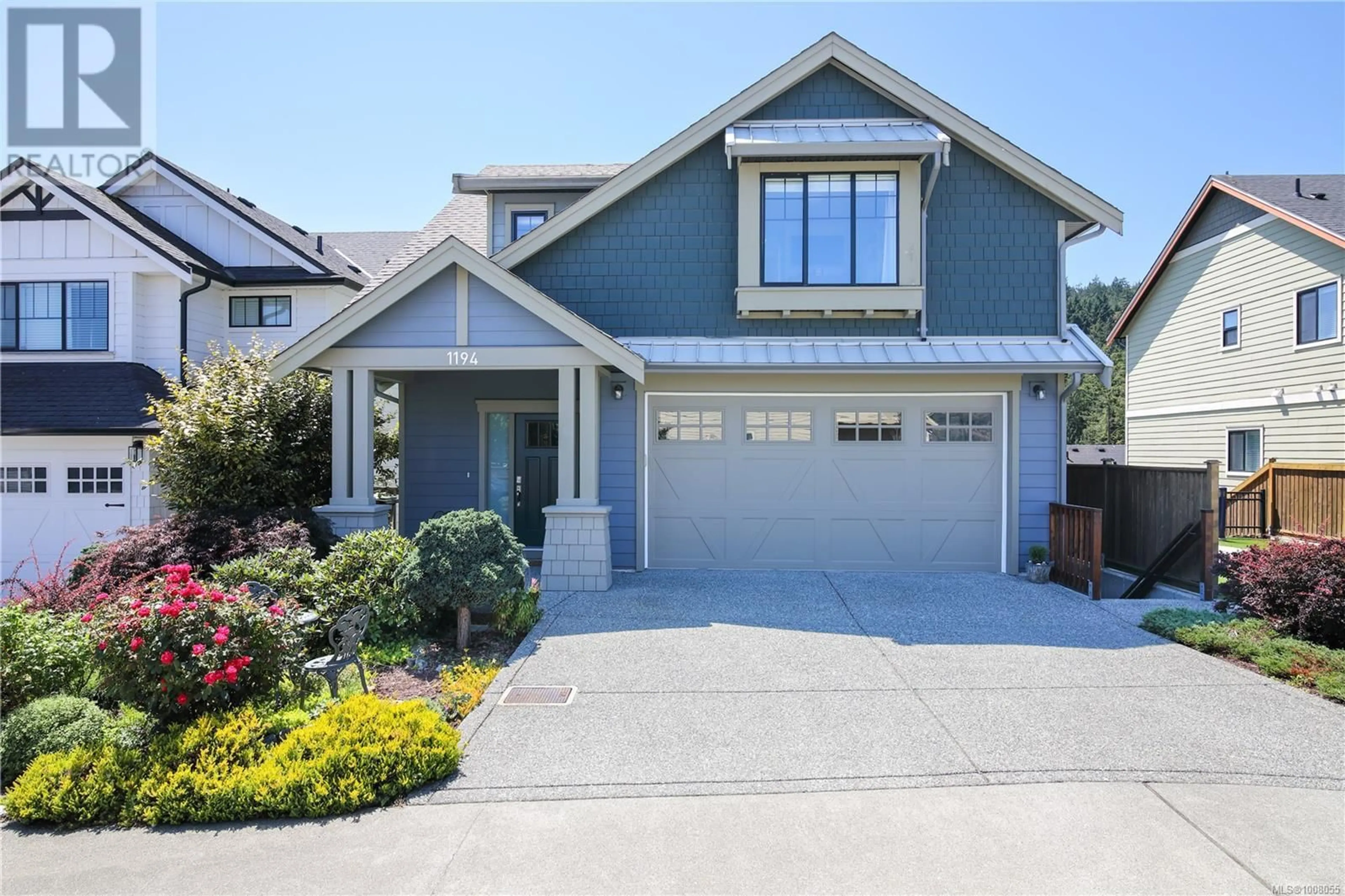 Home with vinyl exterior material, street for 1194 BOMBARDIER CRESCENT, Langford British Columbia V9B0R2
