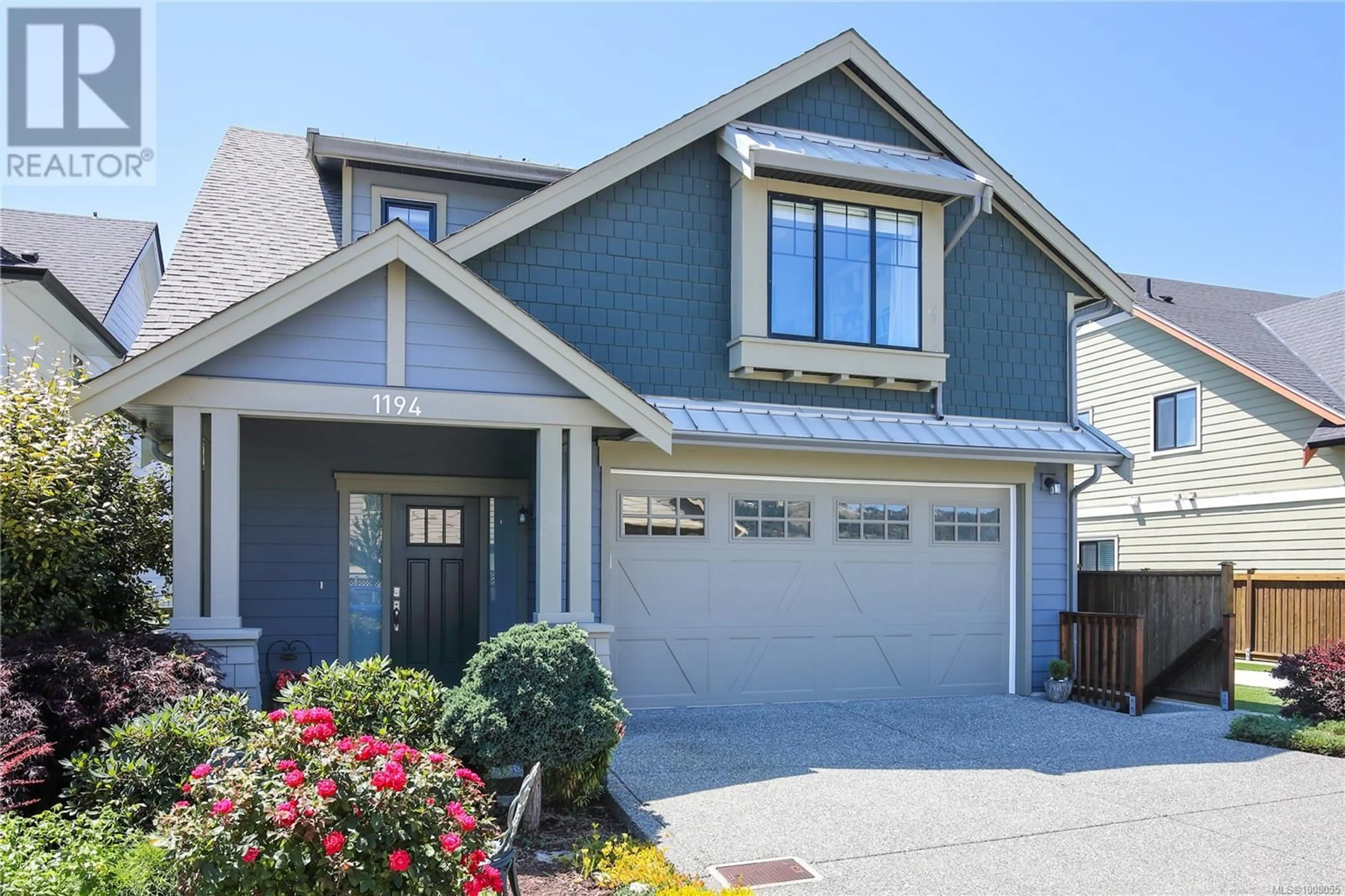 Home with vinyl exterior material, street for 1194 BOMBARDIER CRESCENT, Langford British Columbia V9B0R2
