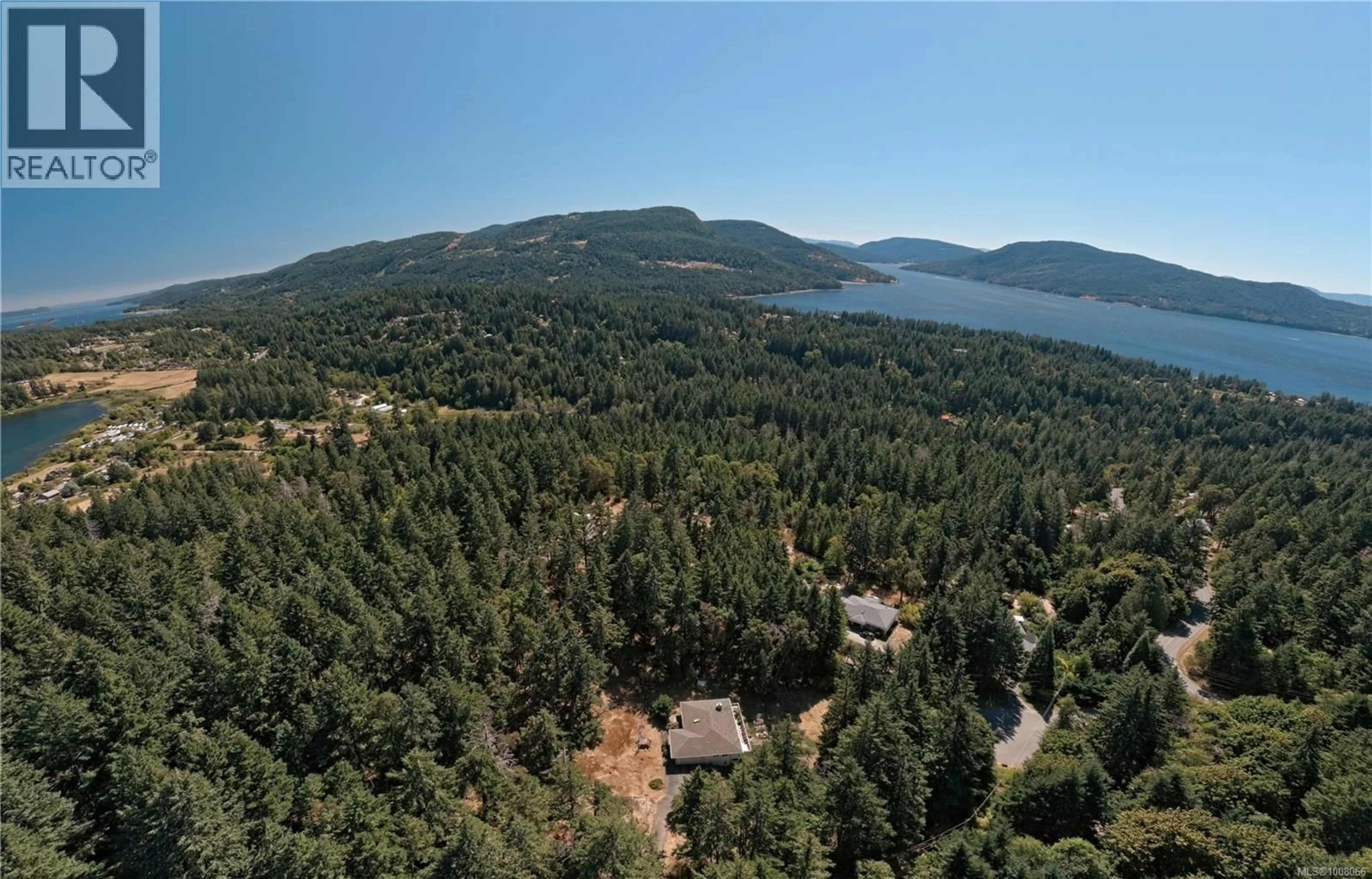 A pic from outside/outdoor area/front of a property/back of a property/a pic from drone, forest/trees view for 180 LAKEFAIR DRIVE, Salt Spring British Columbia V8K1K6