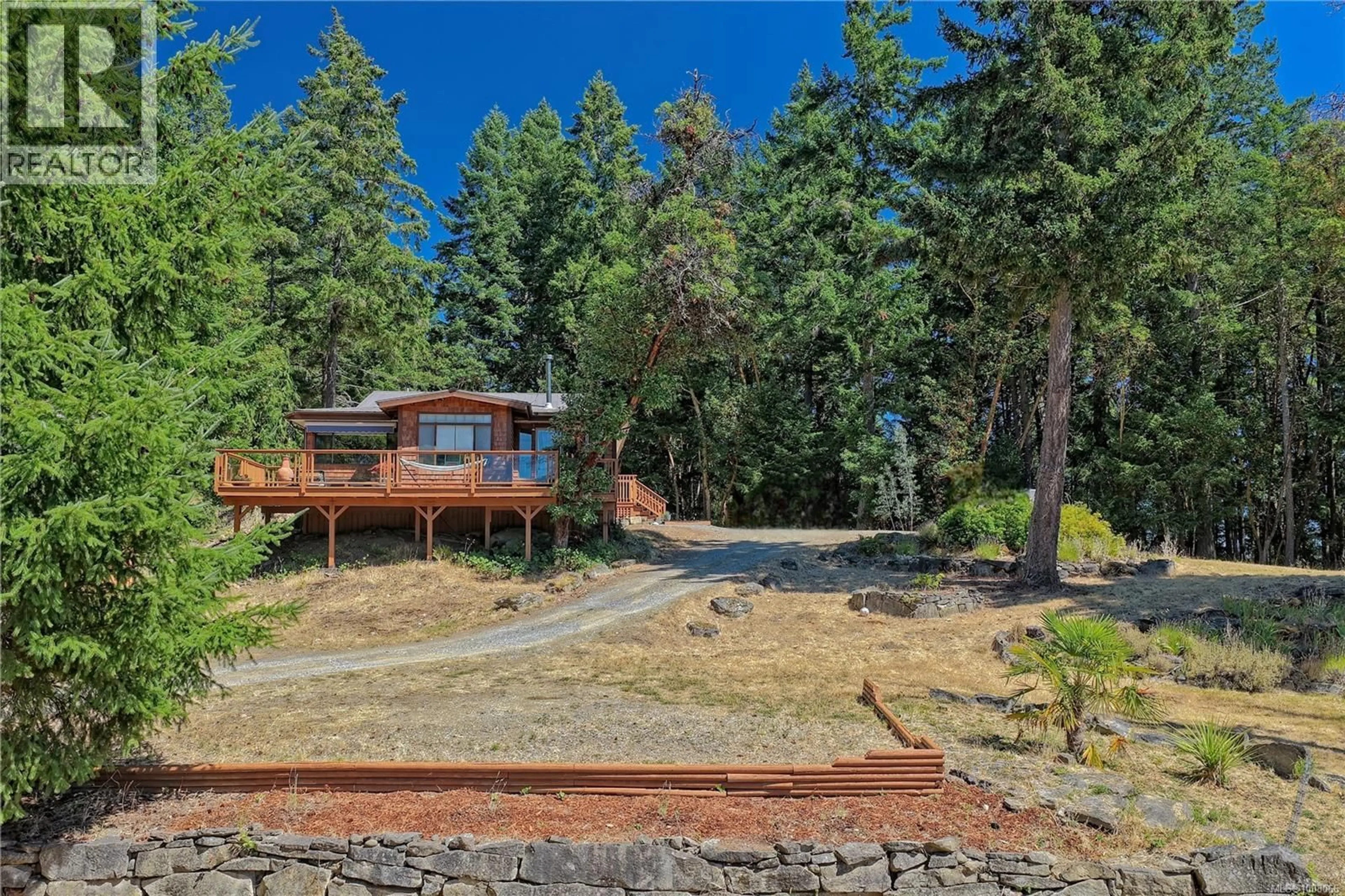 A pic from outside/outdoor area/front of a property/back of a property/a pic from drone, forest/trees view for 180 LAKEFAIR DRIVE, Salt Spring British Columbia V8K1K6