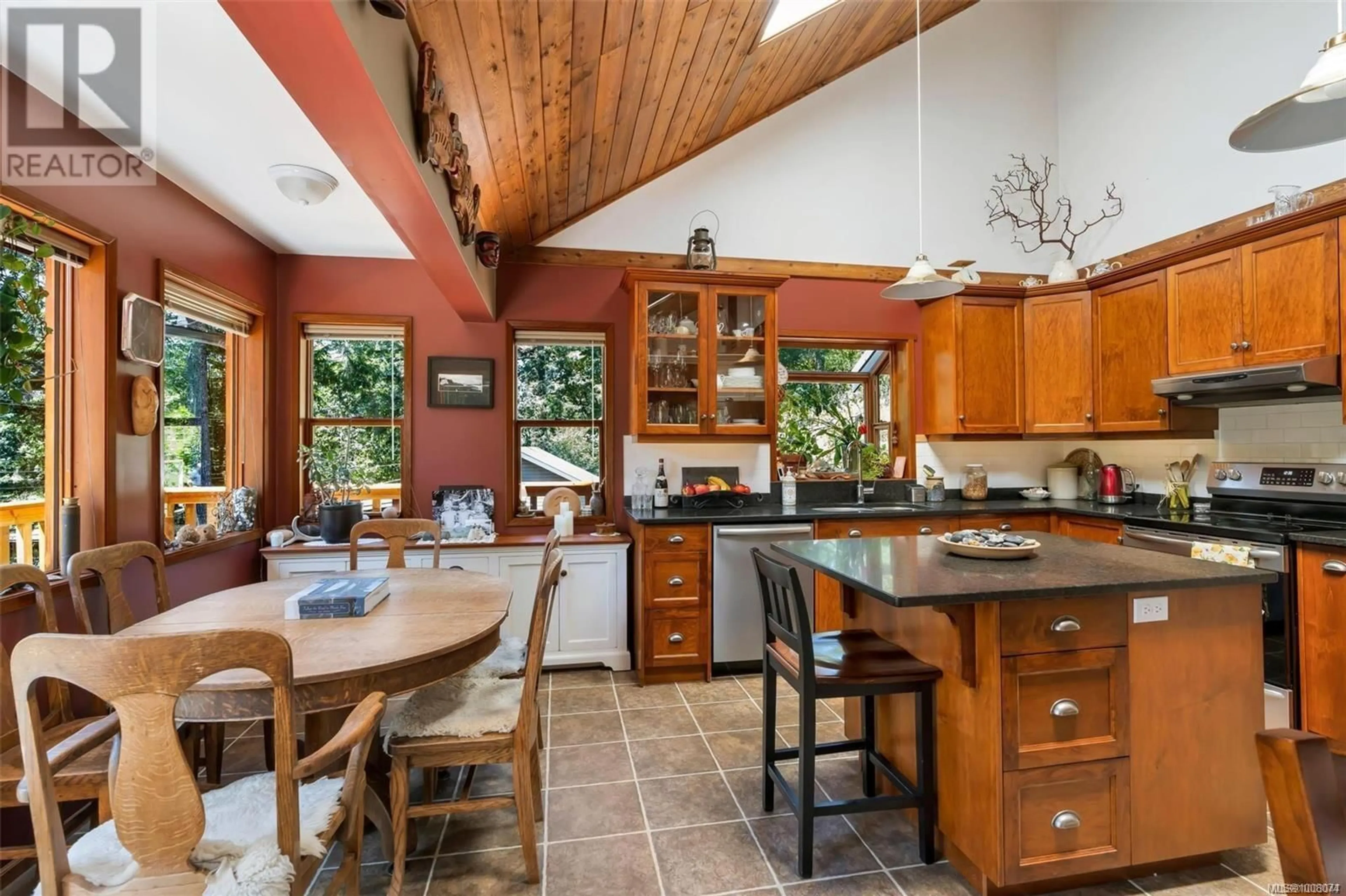 Open concept kitchen, ceramic/tile floor for 997 HERD ROAD, Duncan British Columbia V9L5W9