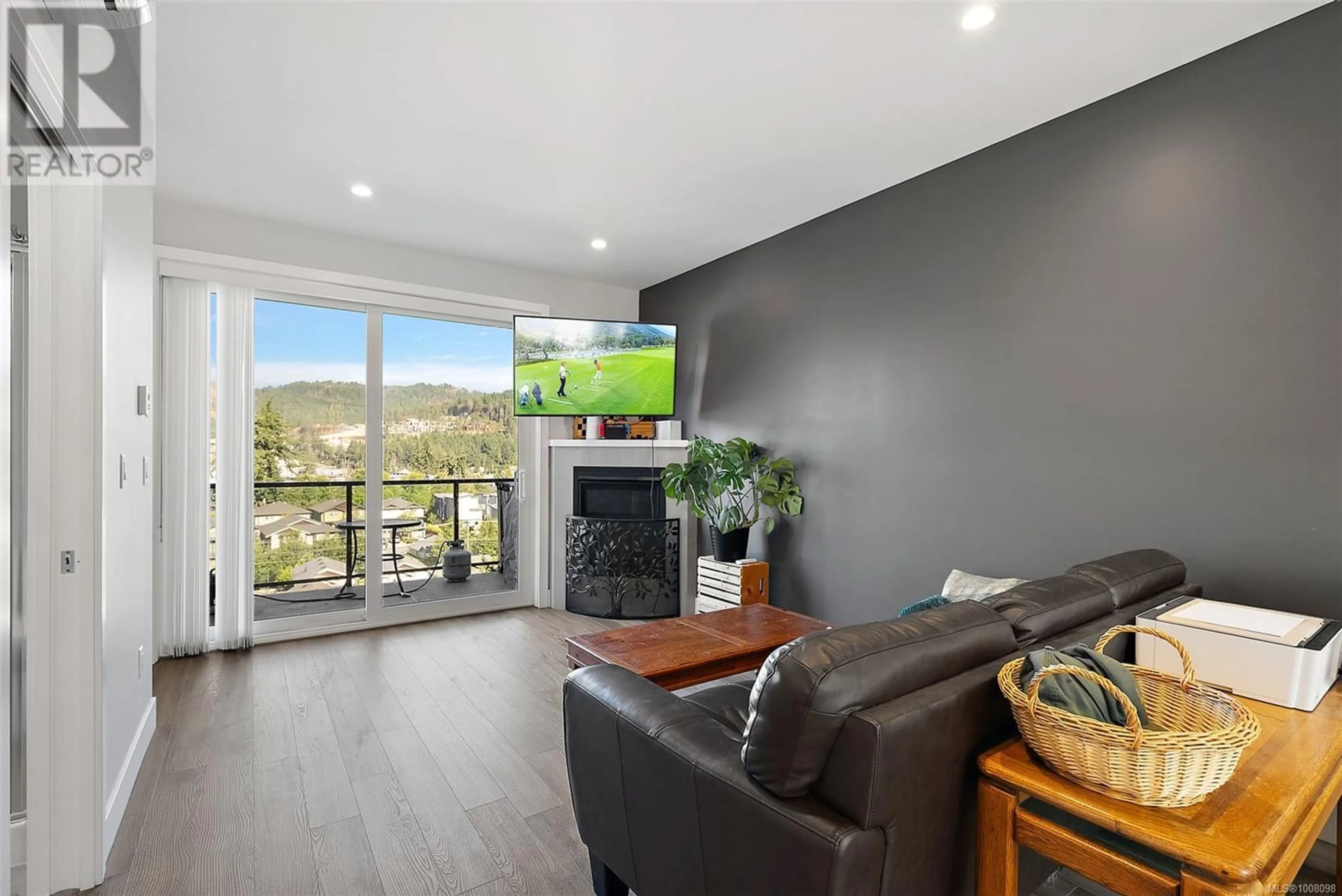 Living room with furniture, wood/laminate floor for 920 TURNSTONE RIDGE, Langford British Columbia V9C2Y4