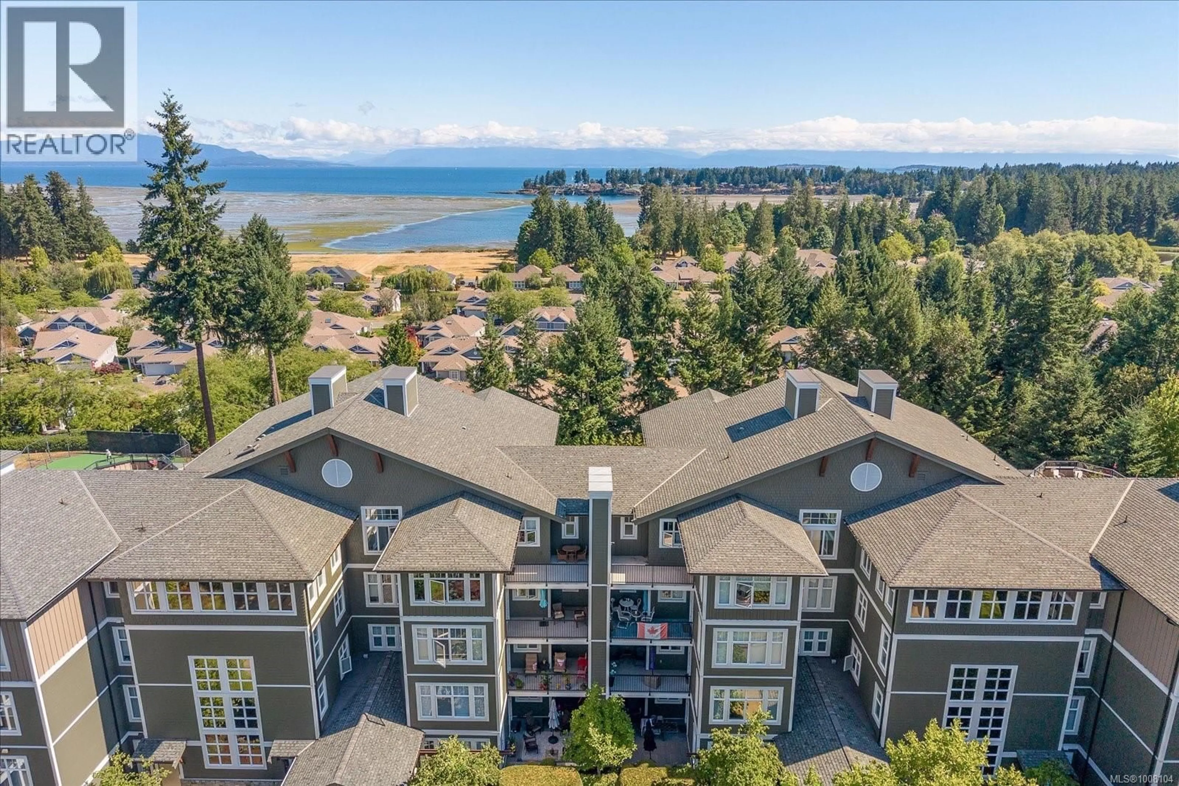 A pic from outside/outdoor area/front of a property/back of a property/a pic from drone, water/lake/river/ocean view for 402 - 1325 CAPE COD DRIVE, Parksville British Columbia V9P2Y8