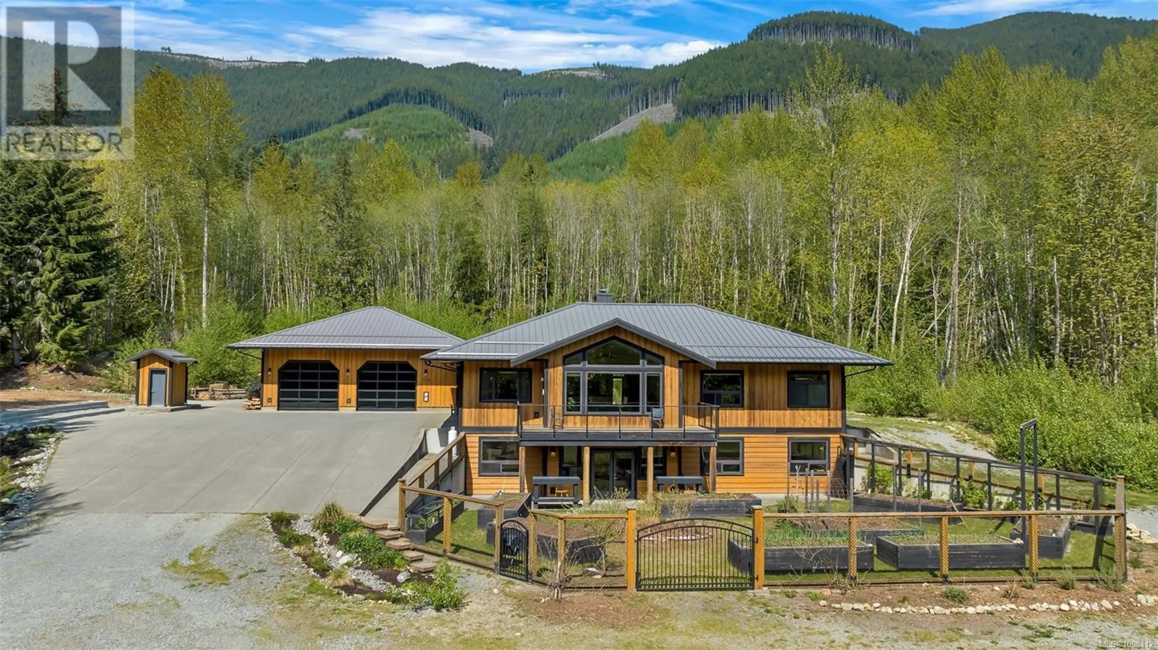 A pic from outside/outdoor area/front of a property/back of a property/a pic from drone, mountain view for 7695 COWICHAN LAKE ROAD, Lake Cowichan British Columbia V0R2G0