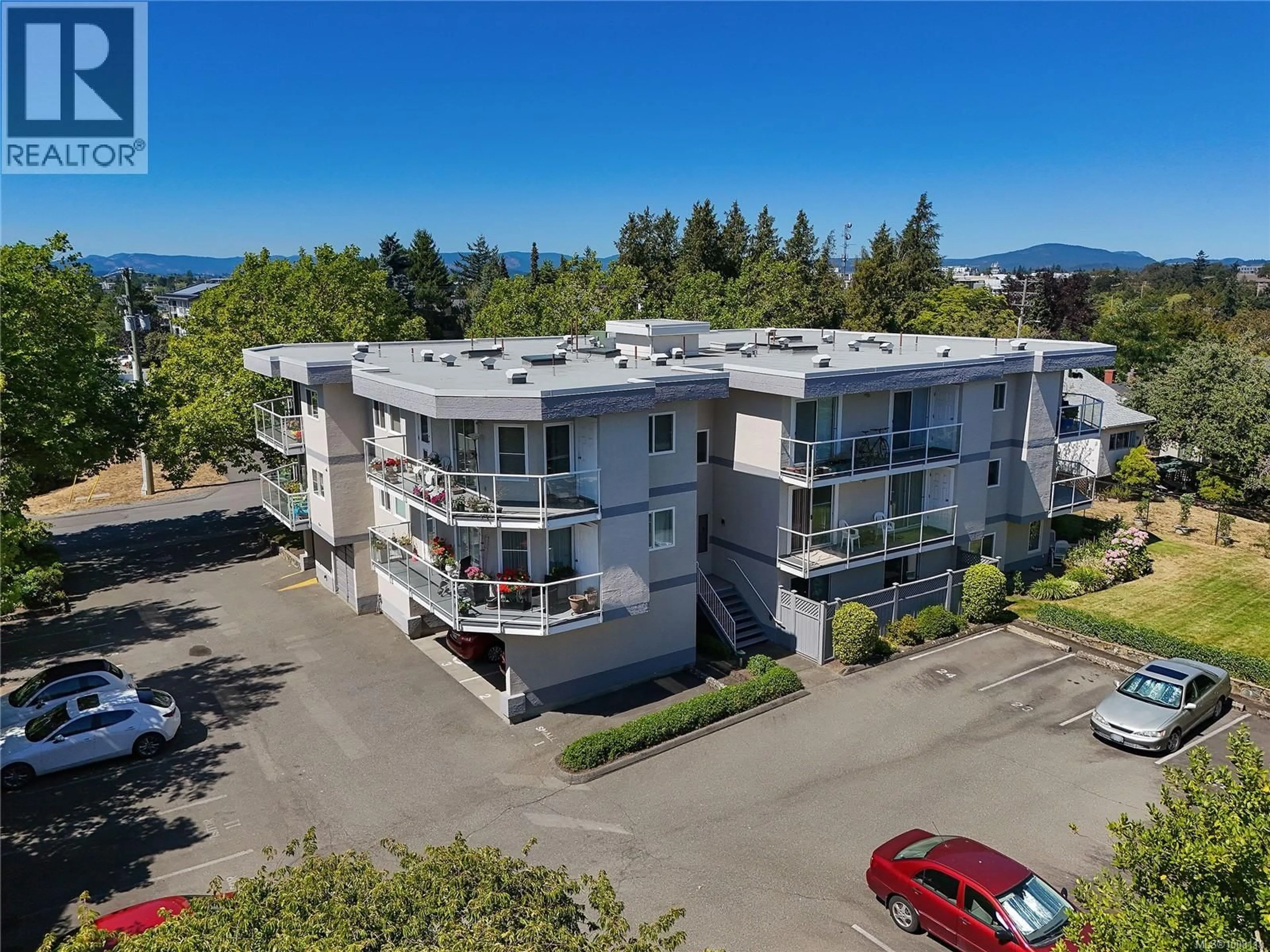 A pic from outside/outdoor area/front of a property/back of a property/a pic from drone, unknown for 201 - 3215 RUTLEDGE STREET, Saanich British Columbia V8X1N6