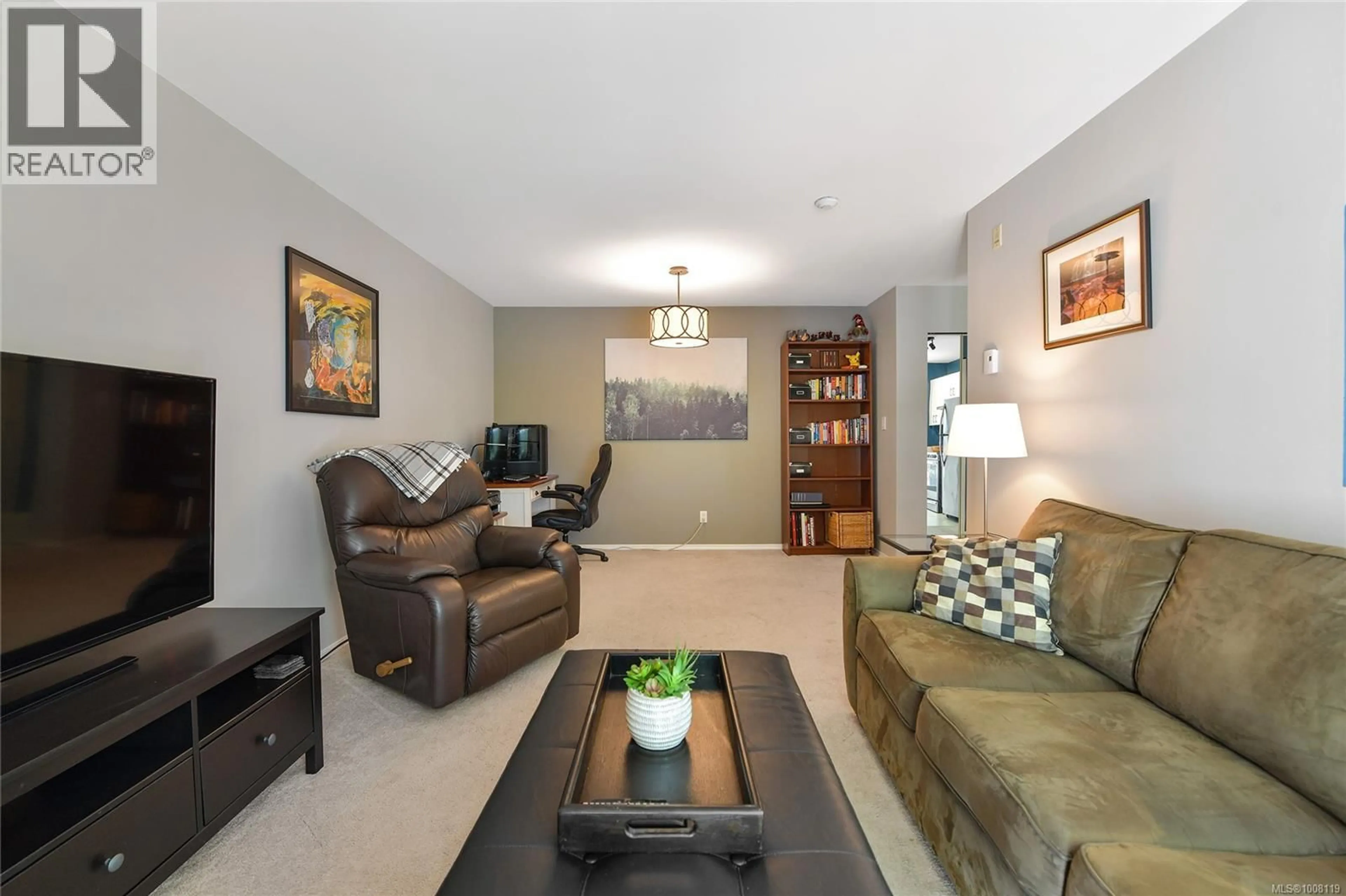 Living room with furniture, unknown for 201 - 3215 RUTLEDGE STREET, Saanich British Columbia V8X1N6