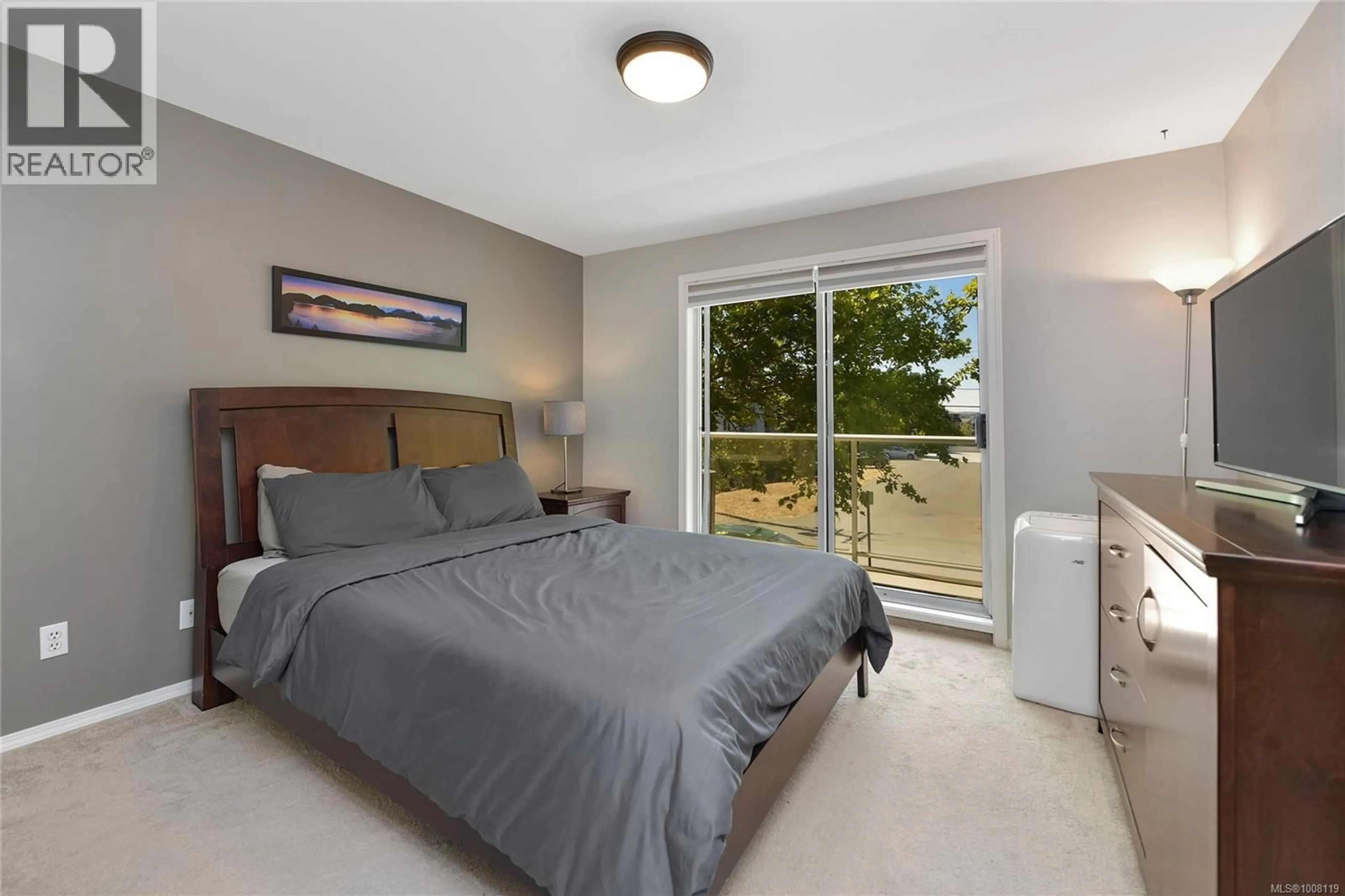 Bedroom with bed, unknown for 201 - 3215 RUTLEDGE STREET, Saanich British Columbia V8X1N6