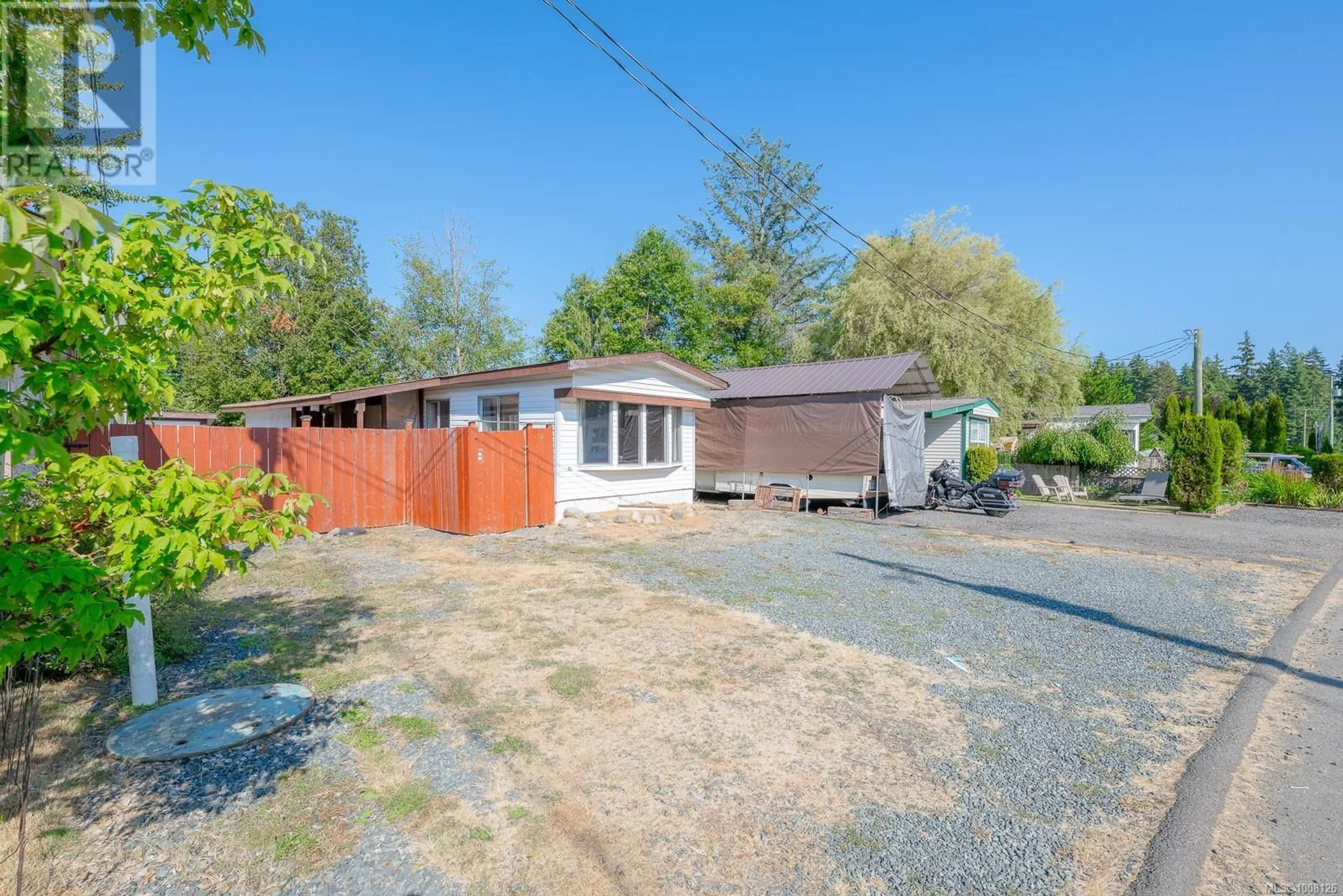 A pic from outside/outdoor area/front of a property/back of a property/a pic from drone, street for 12 - 1700 ALBERNI HIGHWAY, Errington British Columbia V0R1M0