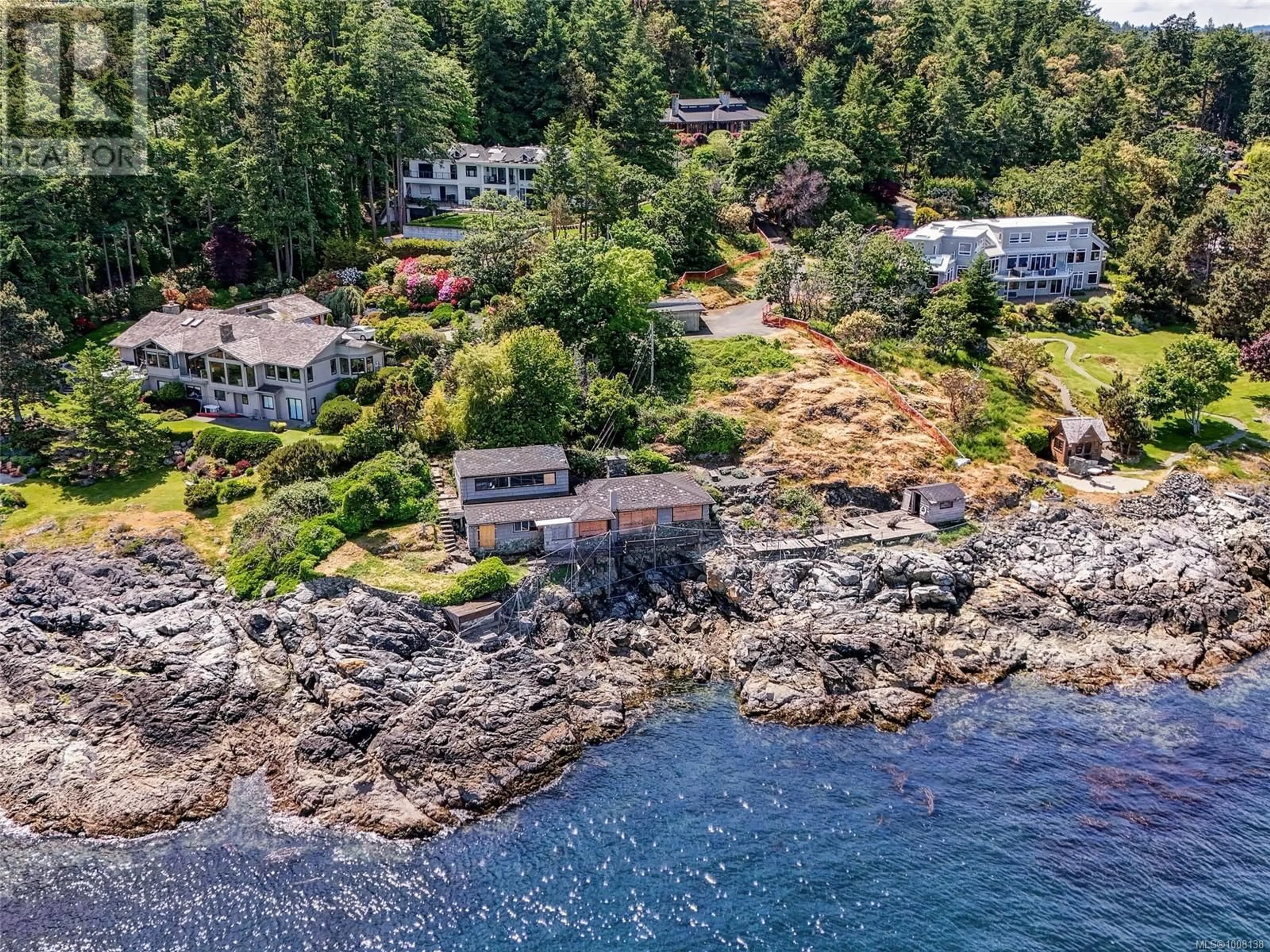 A pic from outside/outdoor area/front of a property/back of a property/a pic from drone, water/lake/river/ocean view for 6000 LOCKEHAVEN DRIVE, Saanich British Columbia V8N4J5