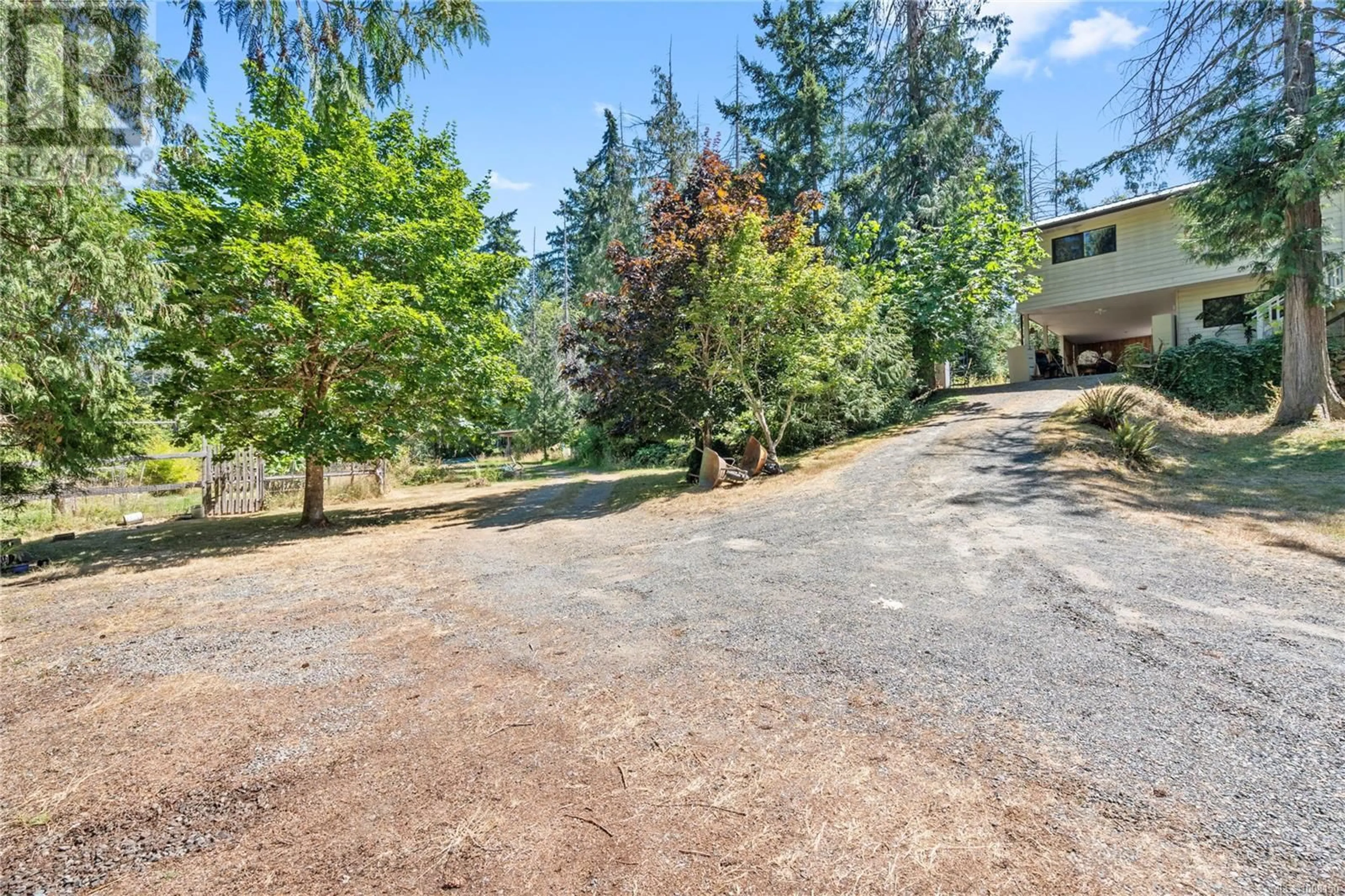 A pic from outside/outdoor area/front of a property/back of a property/a pic from drone, unknown for 1062 BELLEVUE ROAD, Parksville British Columbia V9P2C2