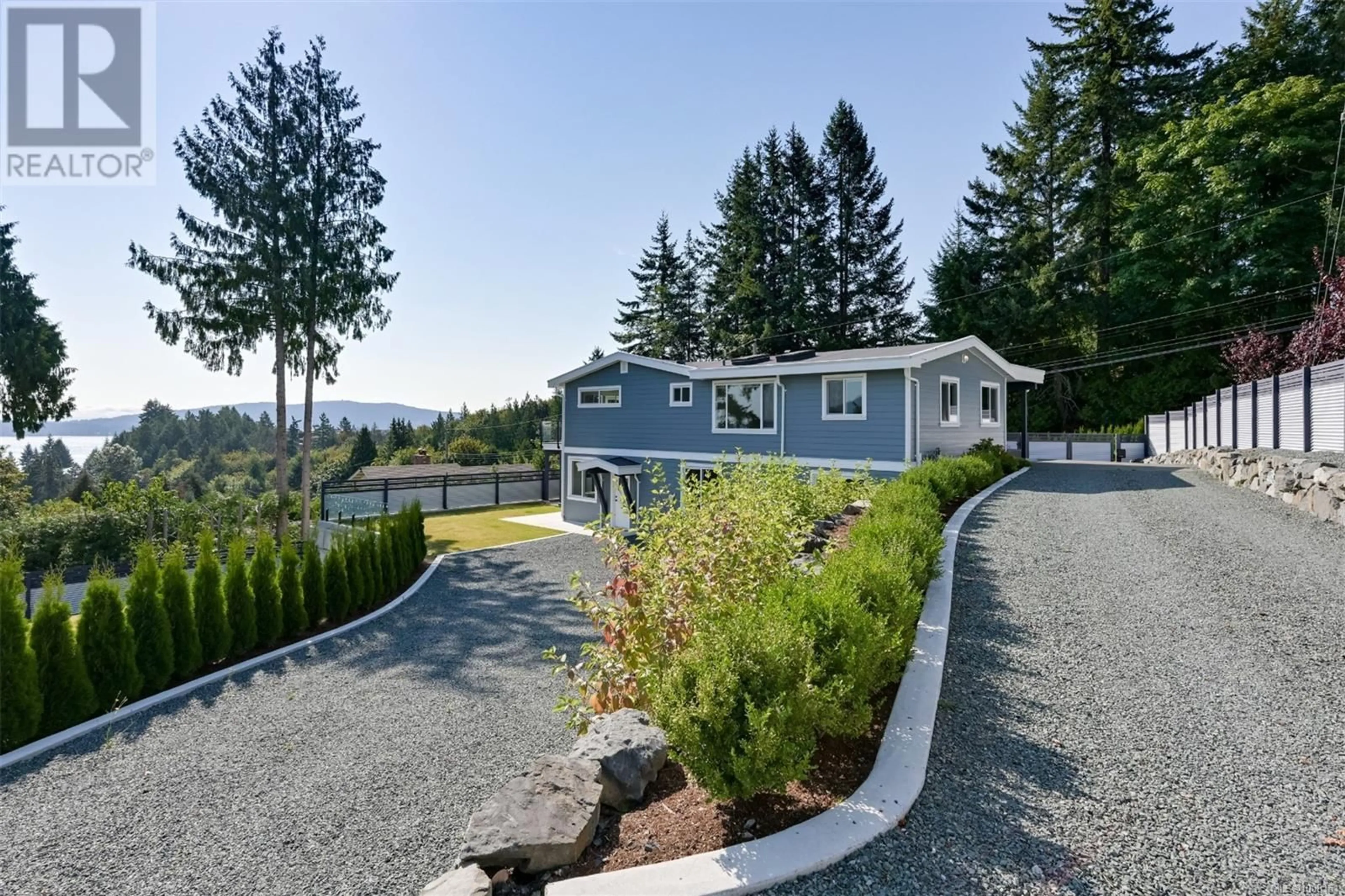 Home with vinyl exterior material, mountain view for 667 NOOWICK ROAD, Mill Bay British Columbia V8H1G5