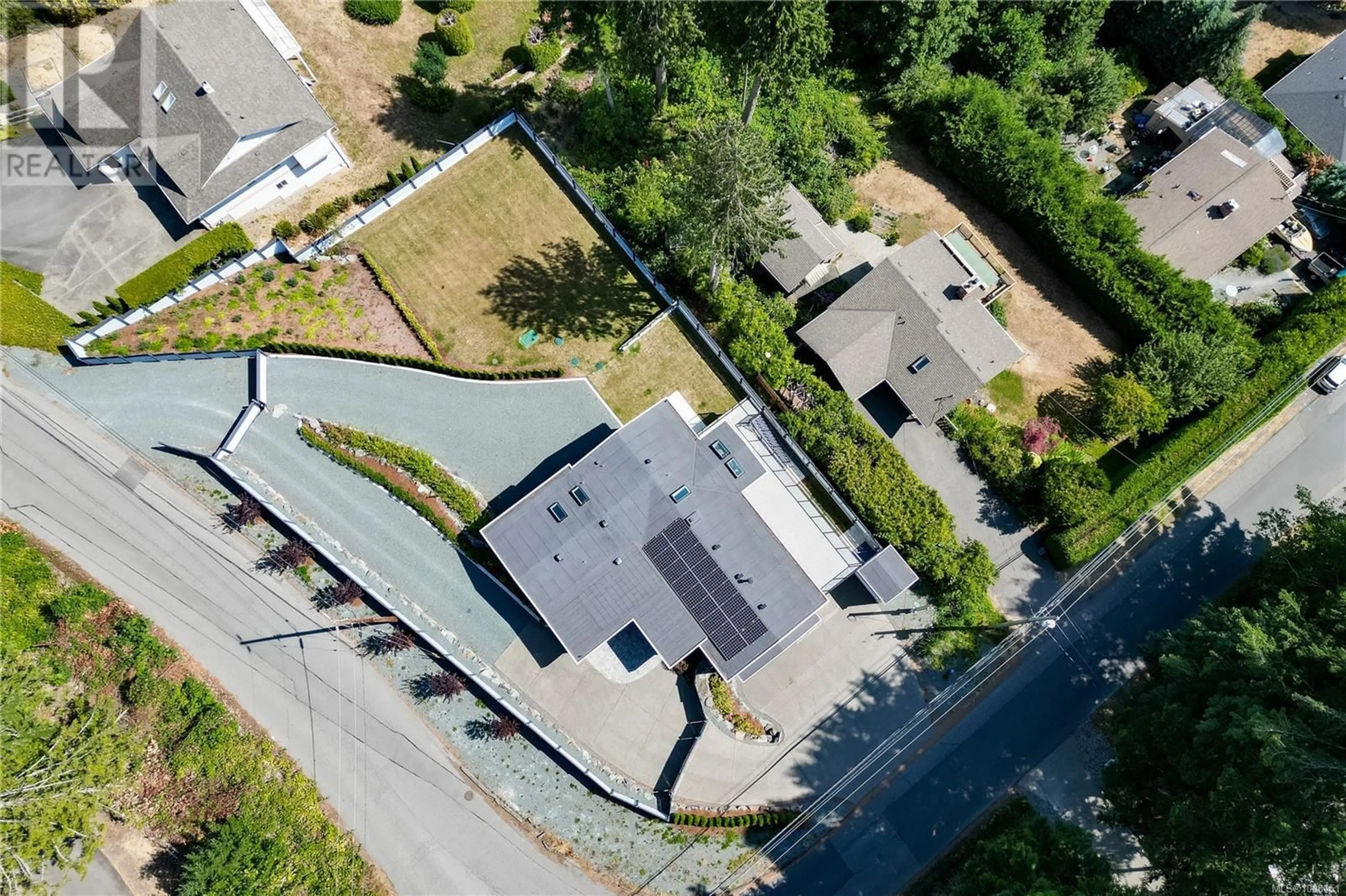 A pic from outside/outdoor area/front of a property/back of a property/a pic from drone, street for 667 NOOWICK ROAD, Mill Bay British Columbia V8H1G5