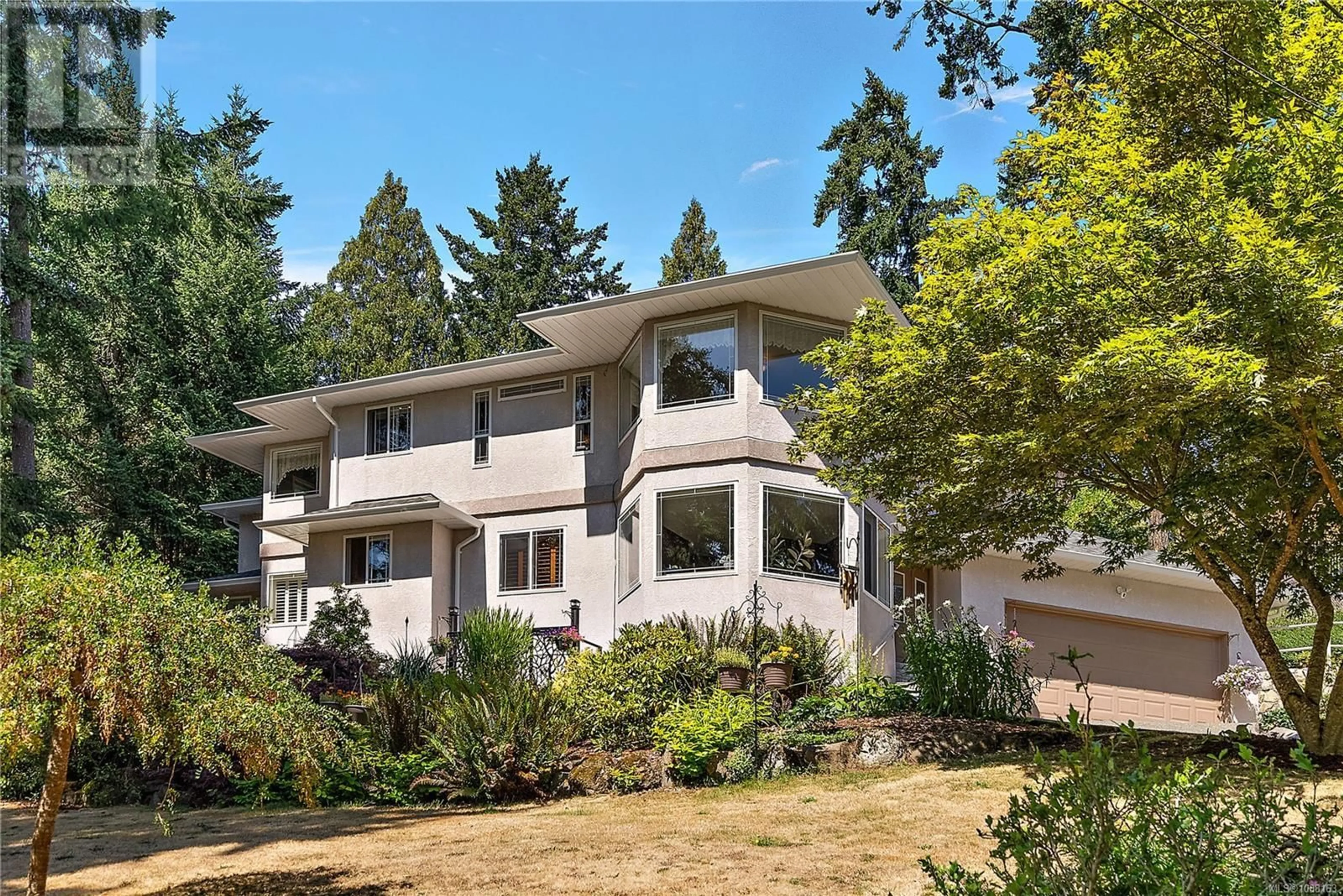 Home with vinyl exterior material, street for 2250 TRYON ROAD, North Saanich British Columbia V8L5H7