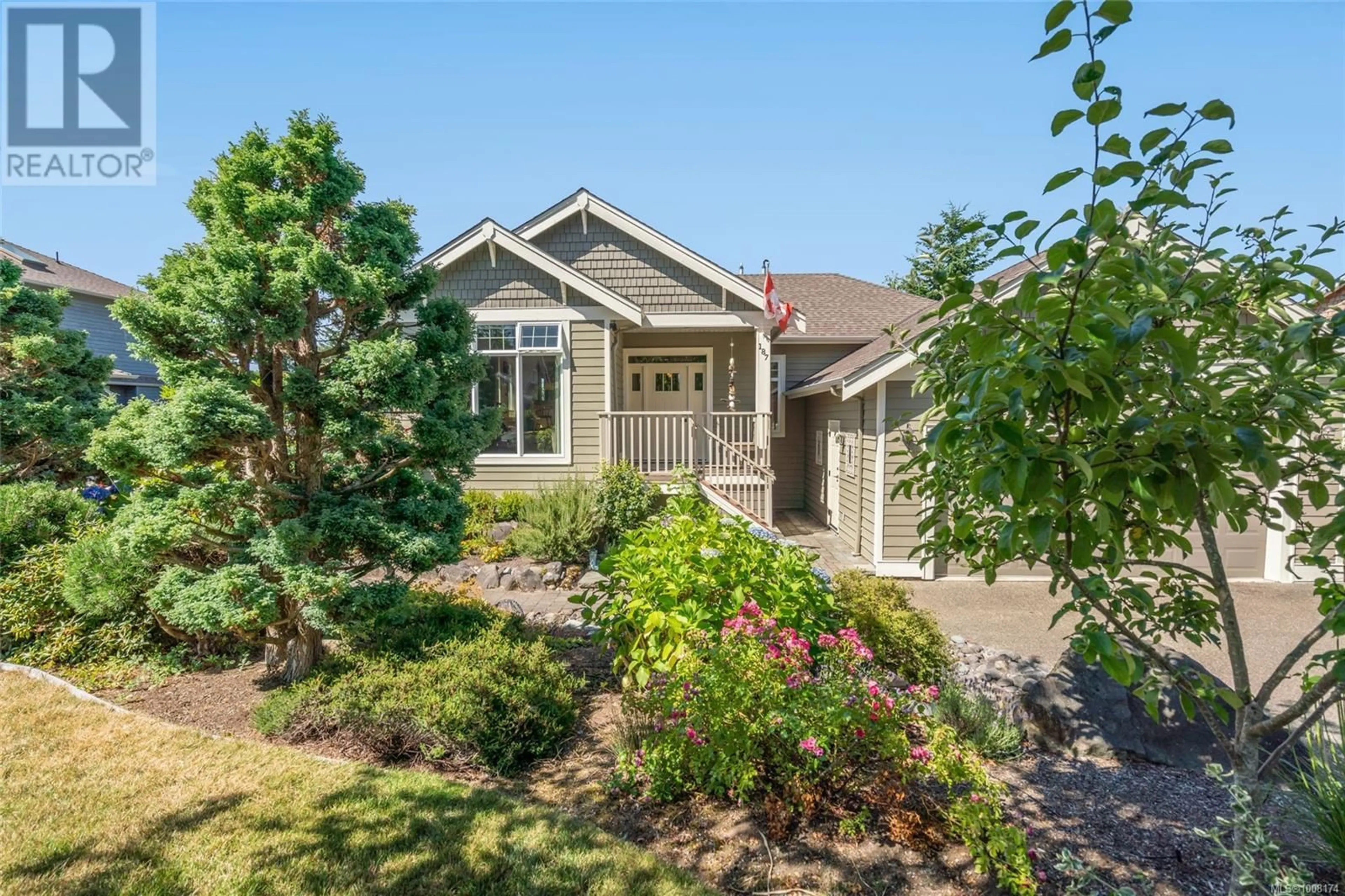 Home with vinyl exterior material, street for 187 SATURNA DRIVE, Qualicum Beach British Columbia V9K2P5