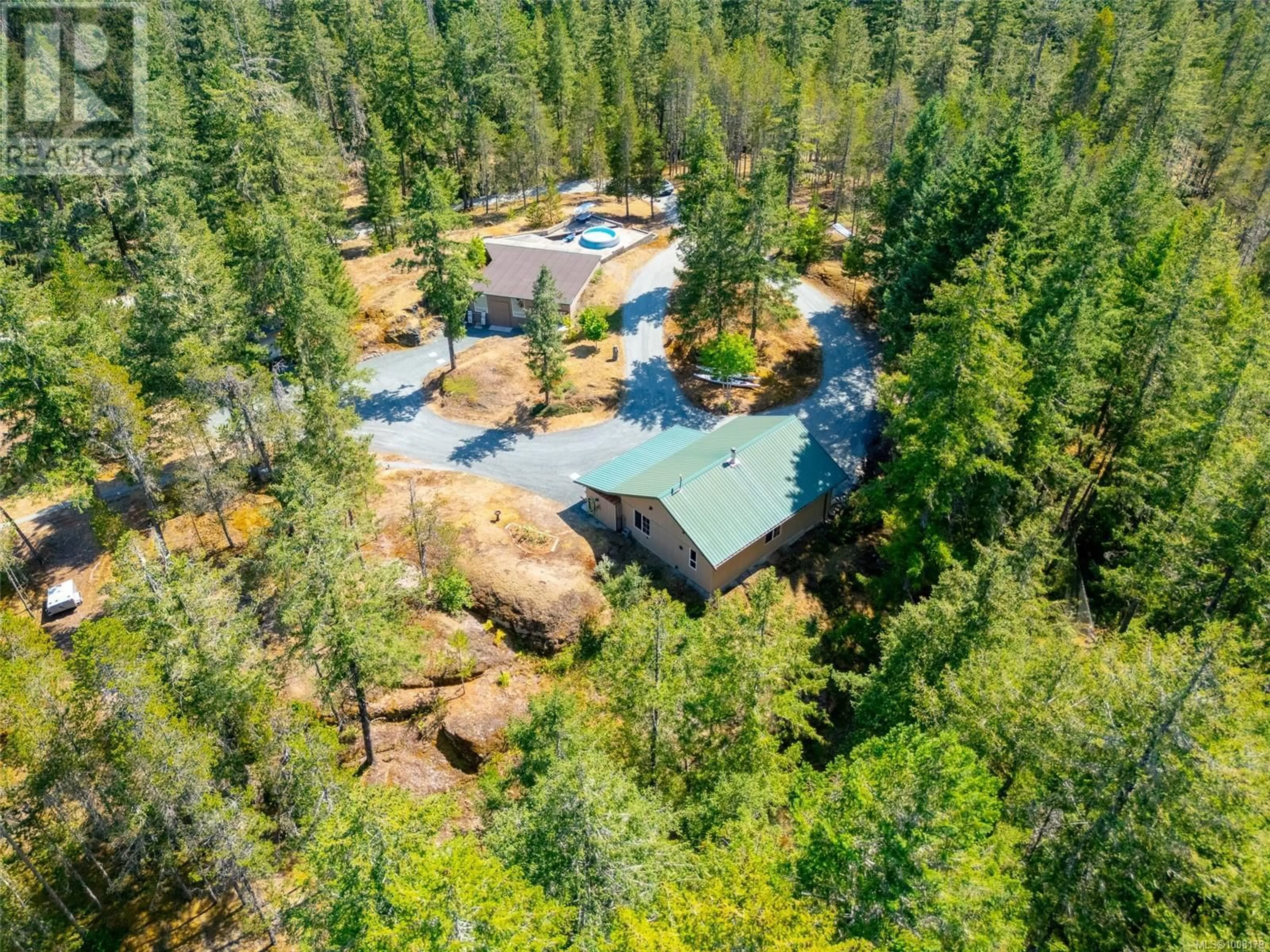 A pic from outside/outdoor area/front of a property/back of a property/a pic from drone, forest/trees view for 7800 PACIFIC RIM HIGHWAY, Port Alberni British Columbia V9Y8Y7