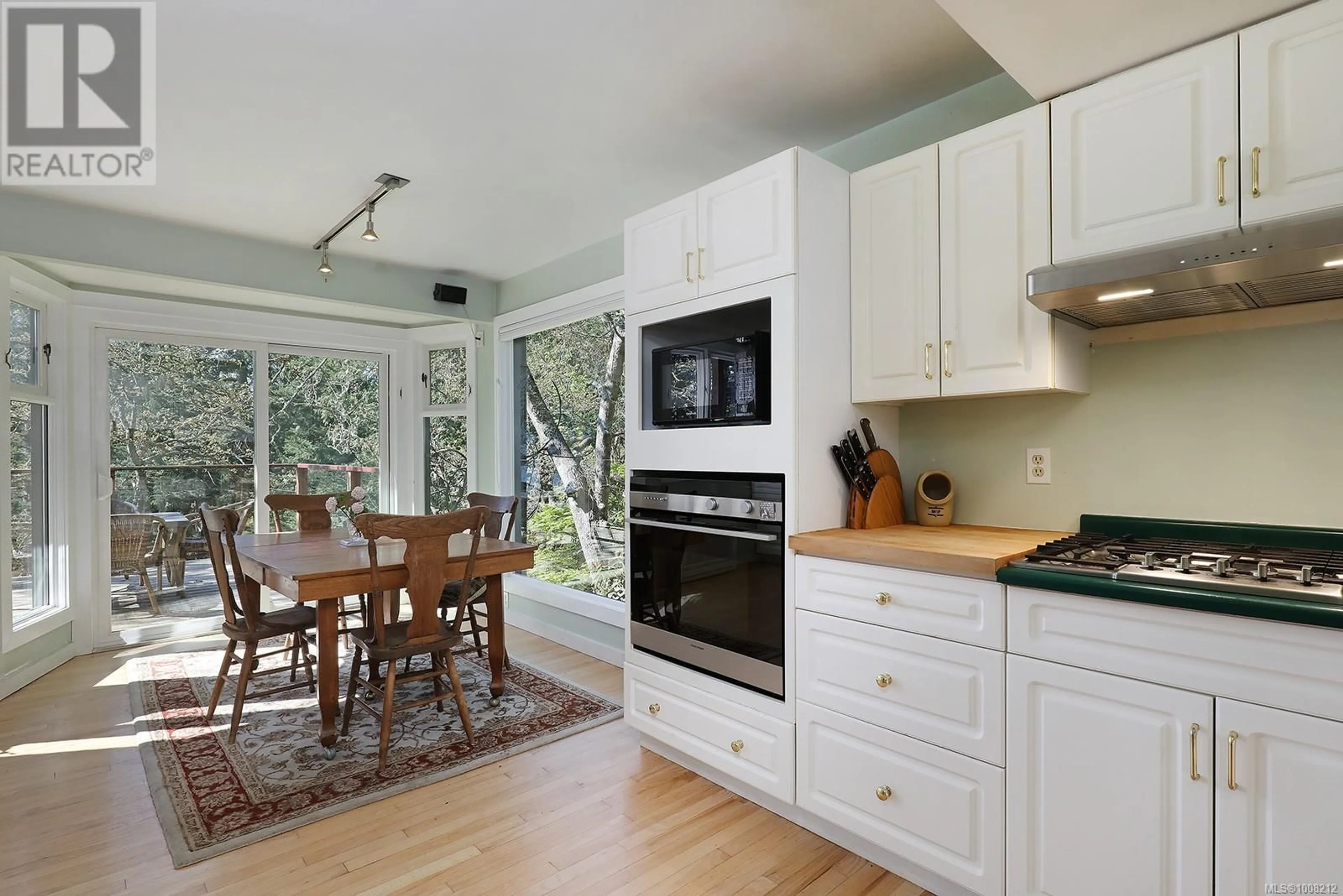 Open concept kitchen, wood/laminate floor for 2399 GARRY OAK DRIVE, Nanoose Bay British Columbia V9P9G1