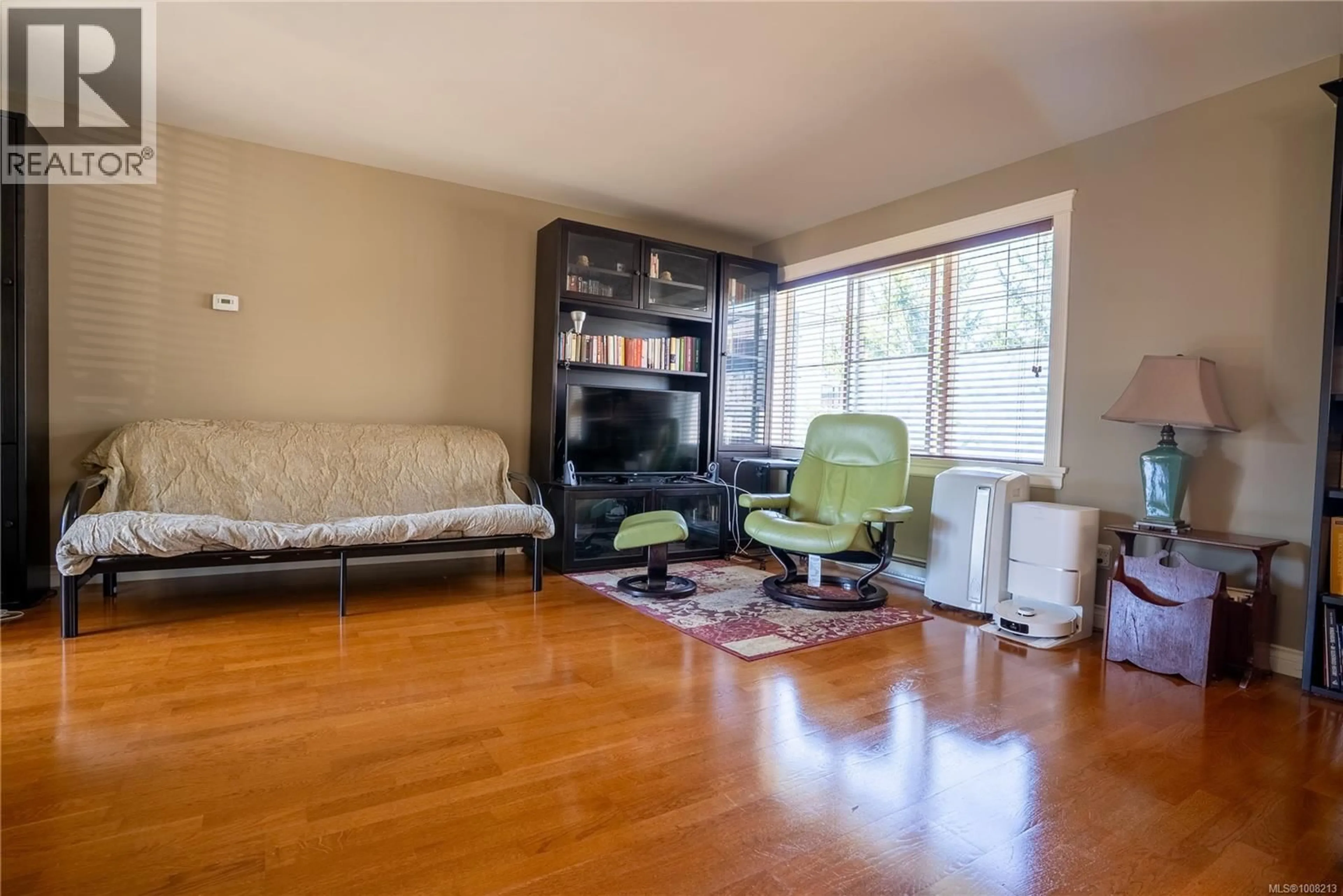 Living room with furniture, wood/laminate floor for 104 - 2678 WINSTER ROAD, Langford British Columbia V9B3R8
