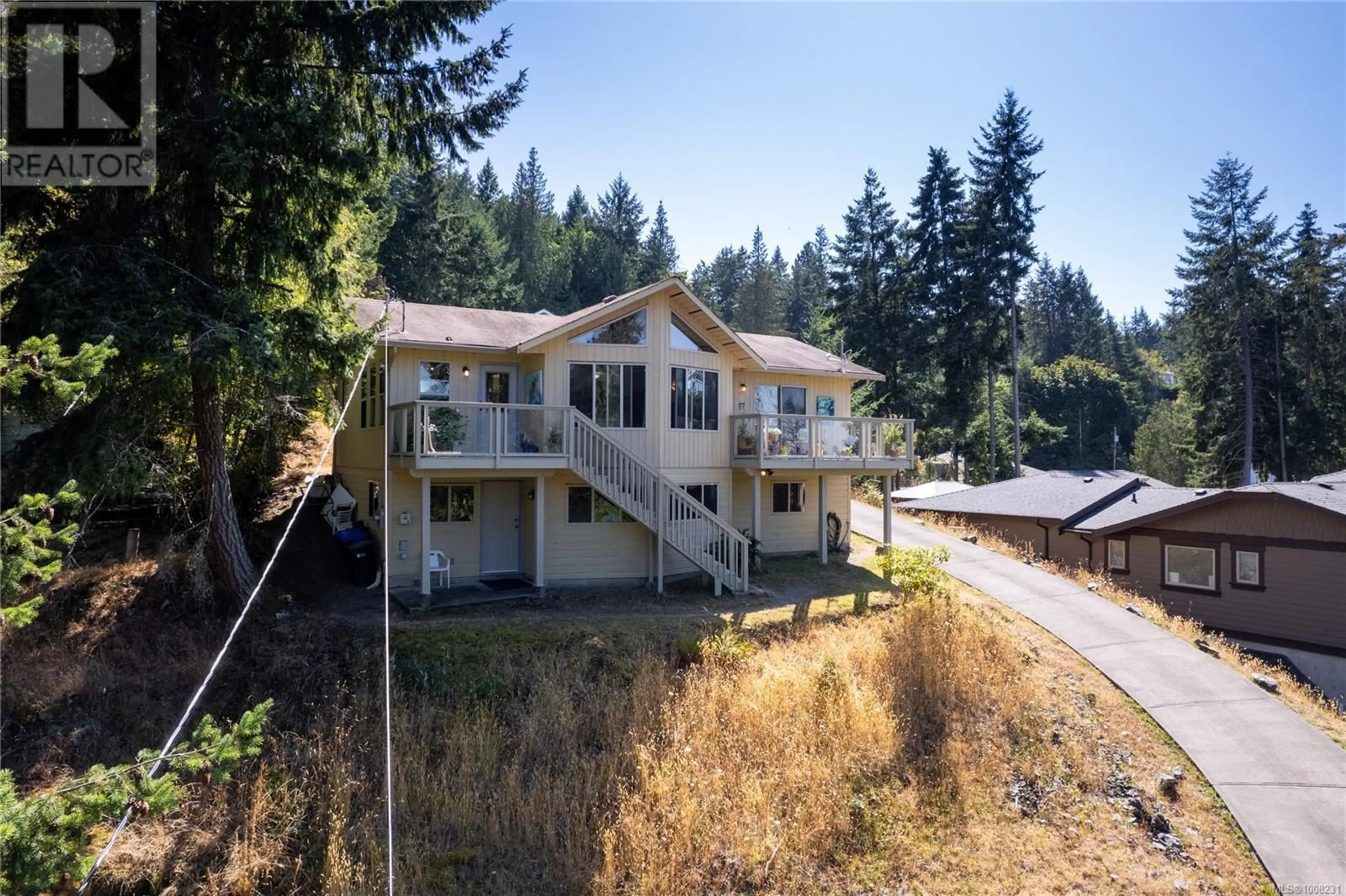 A pic from outside/outdoor area/front of a property/back of a property/a pic from drone, water/lake/river/ocean view for 3122 DOLPHIN DRIVE NORTHWEST, Nanoose Bay British Columbia V9P9J2