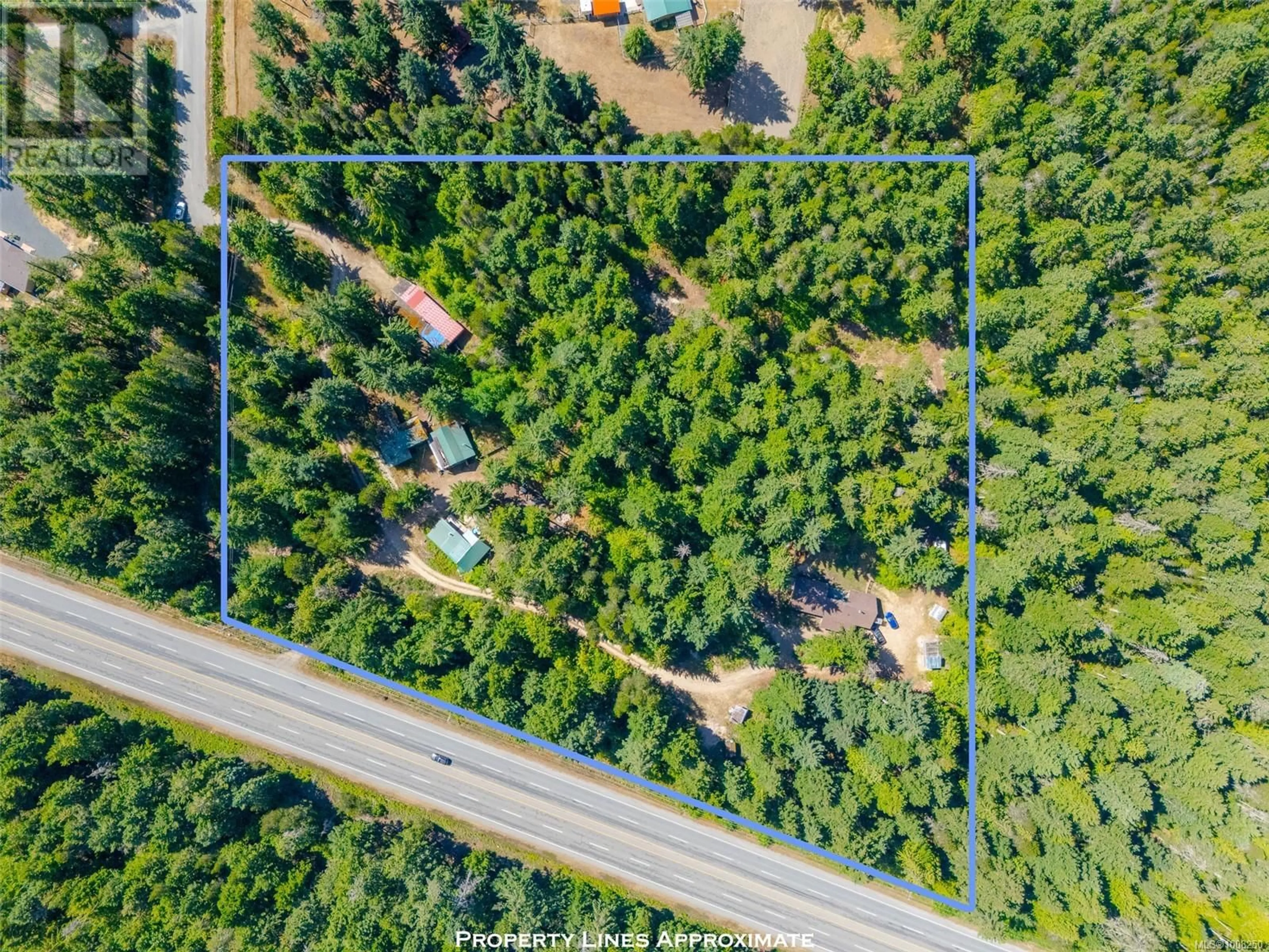 A pic from outside/outdoor area/front of a property/back of a property/a pic from drone, forest/trees view for 300 OAKDOWNE ROAD, Qualicum Beach British Columbia V9K2G1