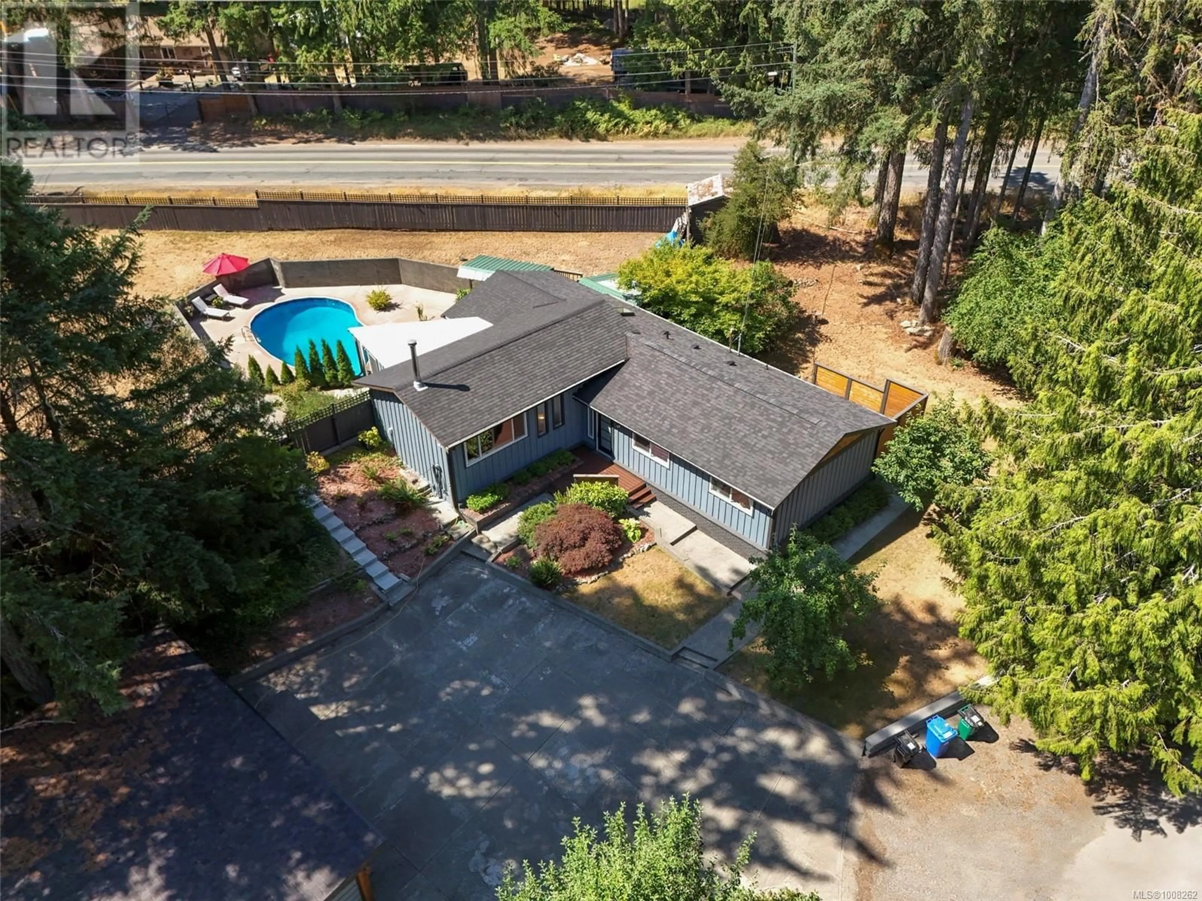 A pic from outside/outdoor area/front of a property/back of a property/a pic from drone, water/lake/river/ocean view for 2350 KEWS ROAD, Shawnigan Lake British Columbia V0R2W3