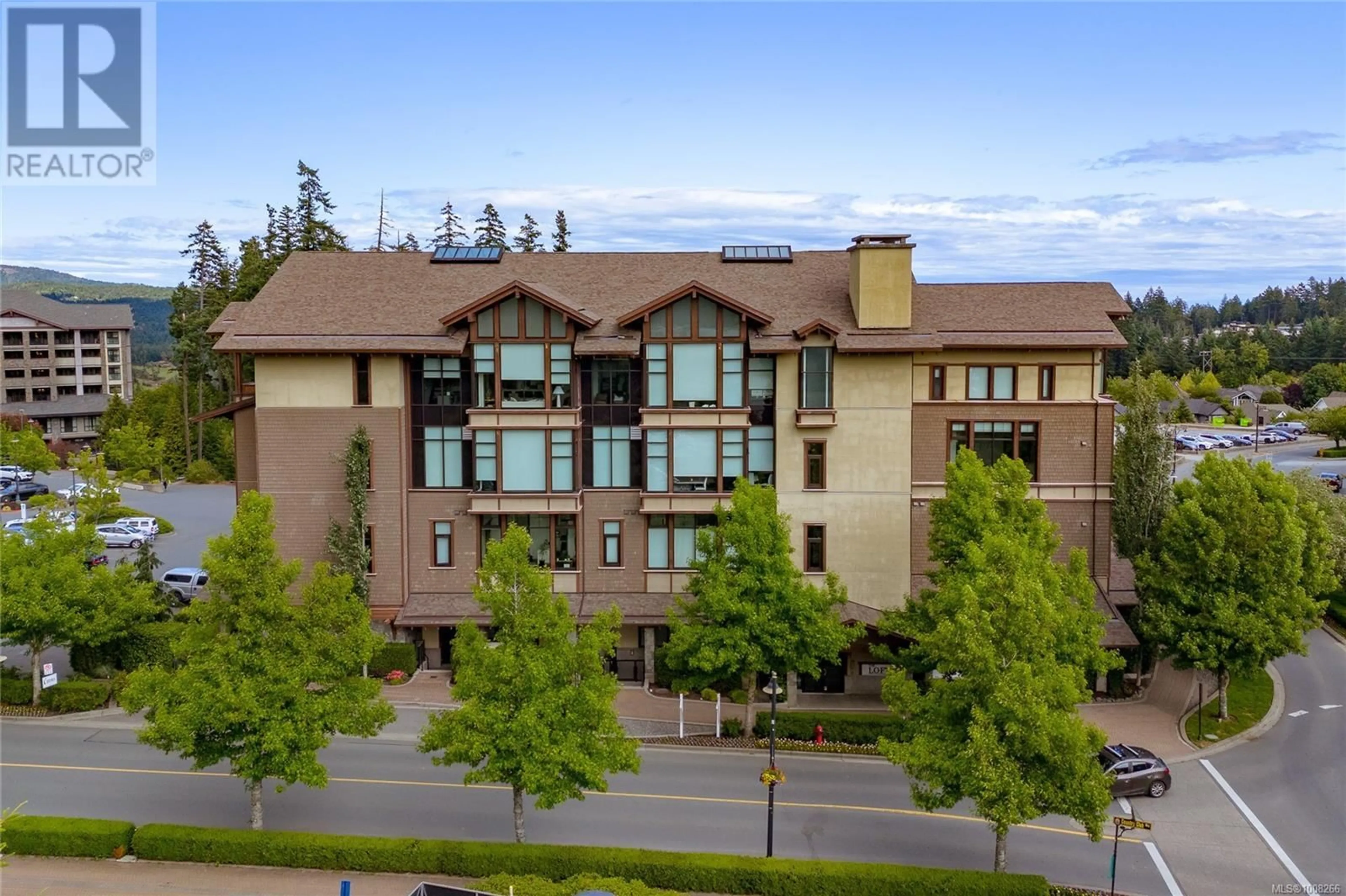 A pic from outside/outdoor area/front of a property/back of a property/a pic from drone, unknown for 106 - 2049 COUNTRY CLUB WAY, Langford British Columbia V9B0H8