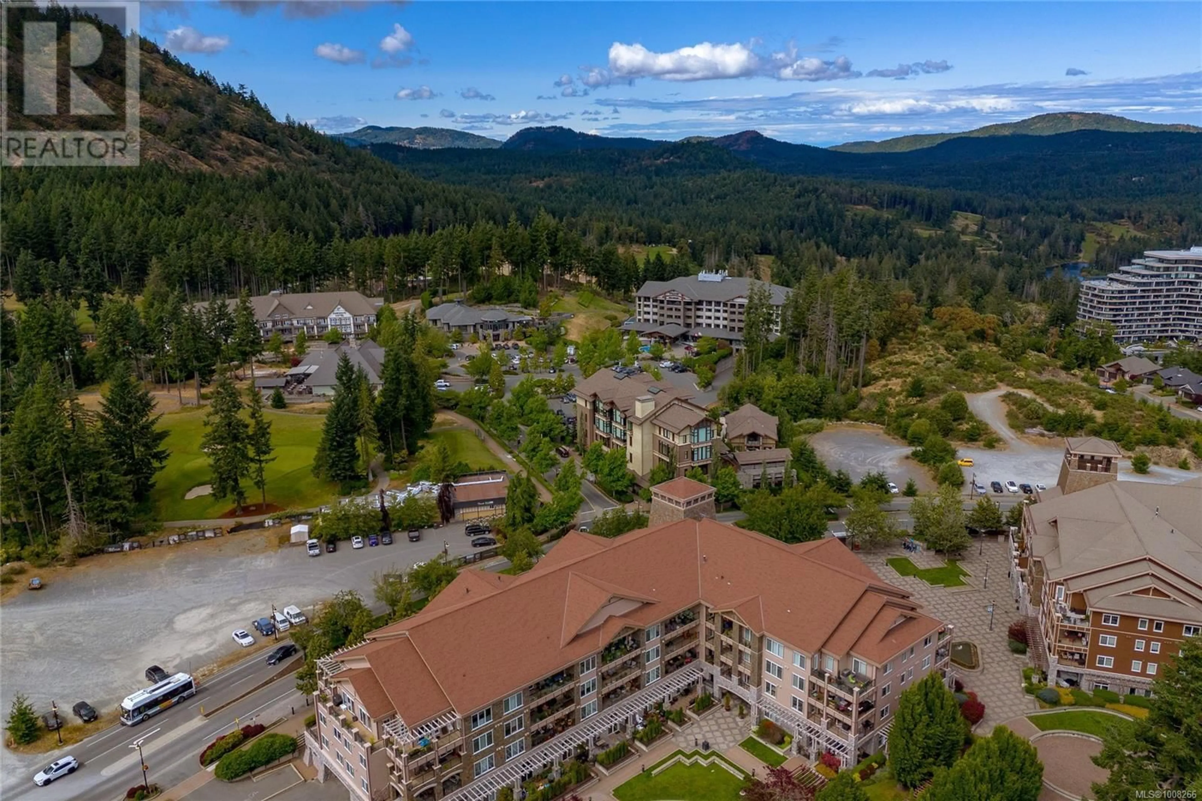 A pic from outside/outdoor area/front of a property/back of a property/a pic from drone, mountain view for 106 - 2049 COUNTRY CLUB WAY, Langford British Columbia V9B0H8