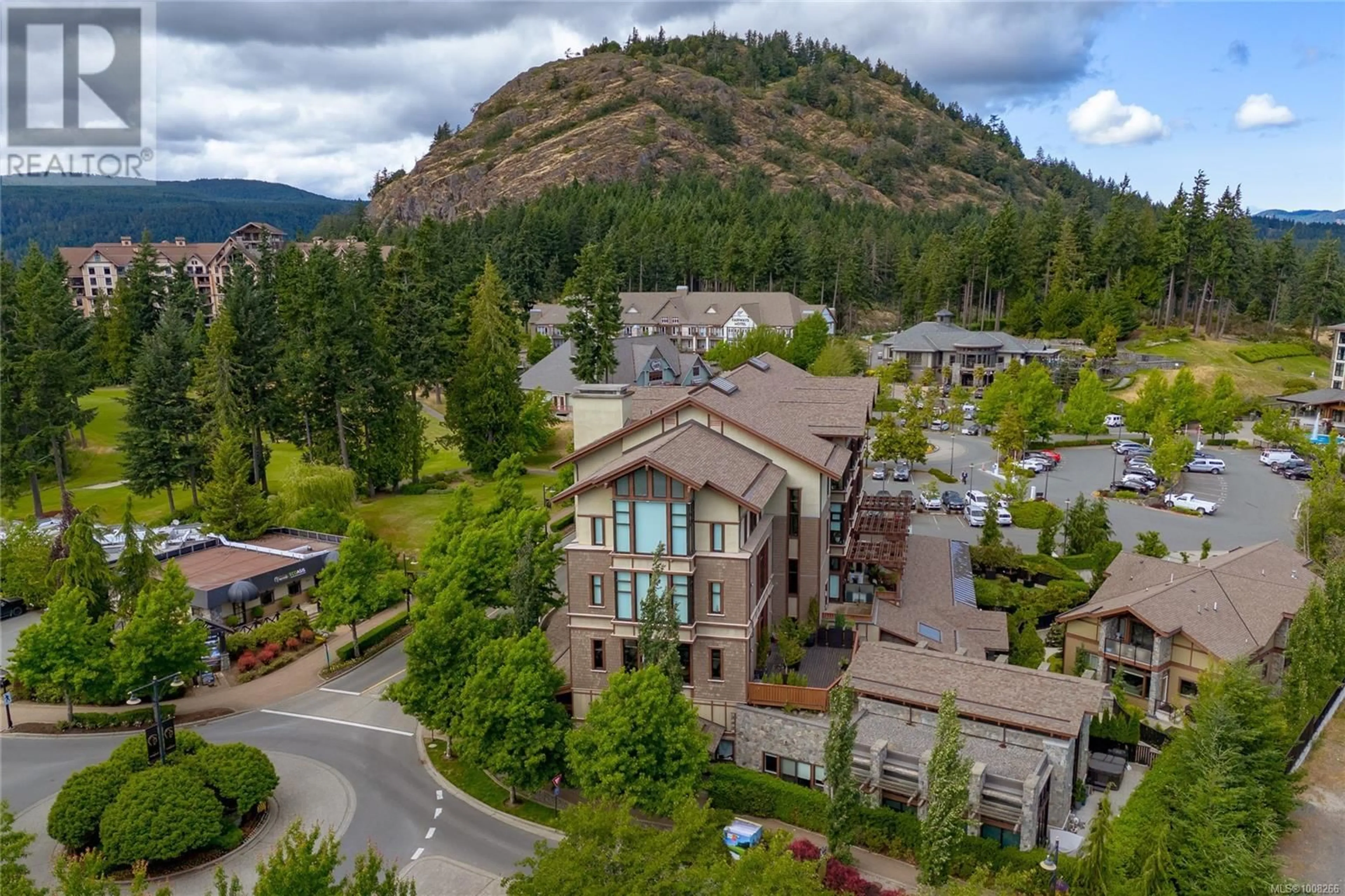 A pic from outside/outdoor area/front of a property/back of a property/a pic from drone, mountain view for 106 - 2049 COUNTRY CLUB WAY, Langford British Columbia V9B0H8