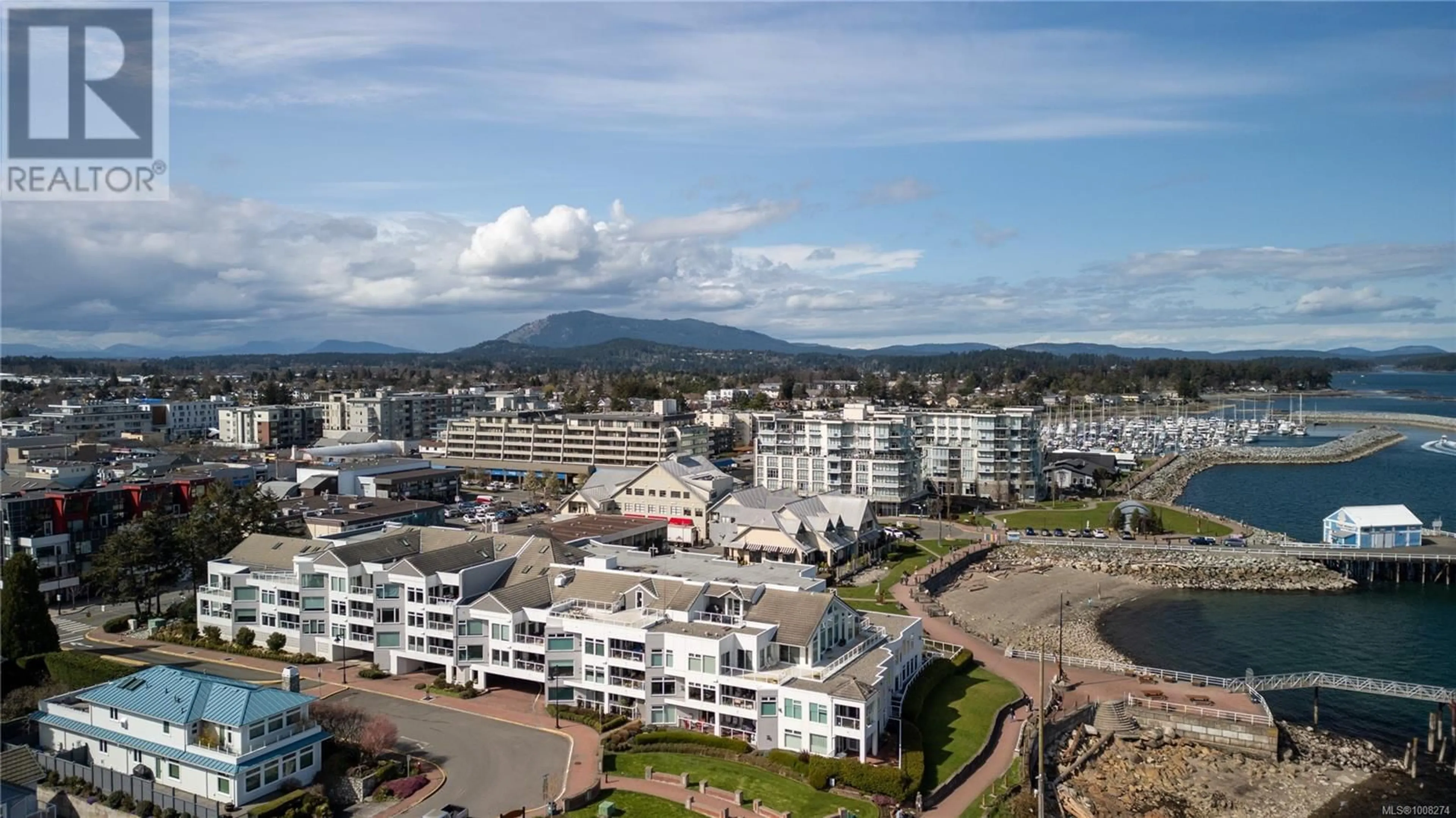 A pic from outside/outdoor area/front of a property/back of a property/a pic from drone, mountain view for 201 - 9809 SEAPORT PLACE, Sidney British Columbia V8L4X3