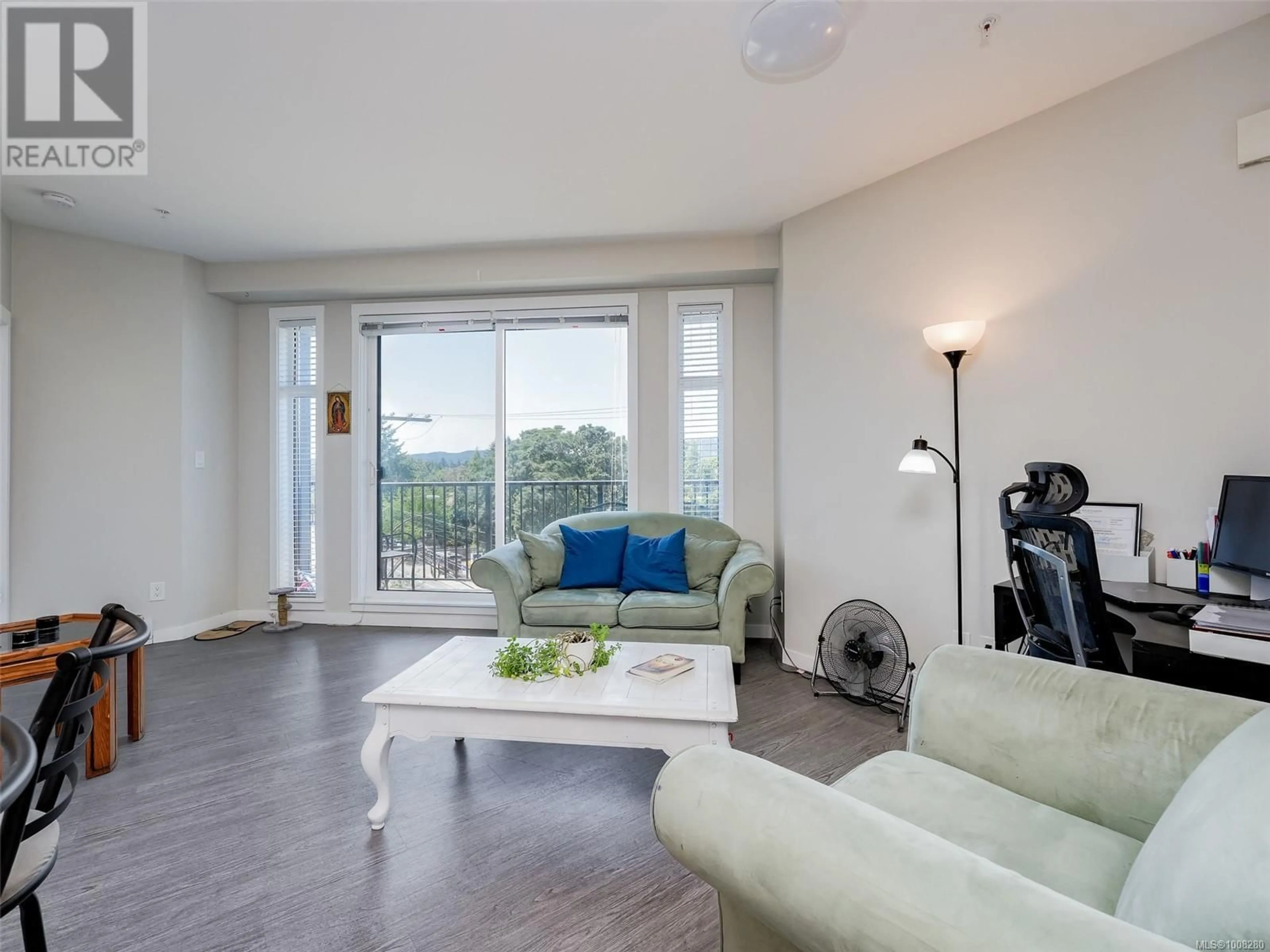 Living room with furniture, wood/laminate floor for 416 - 2843 JACKLIN ROAD, Langford British Columbia V9B4P4
