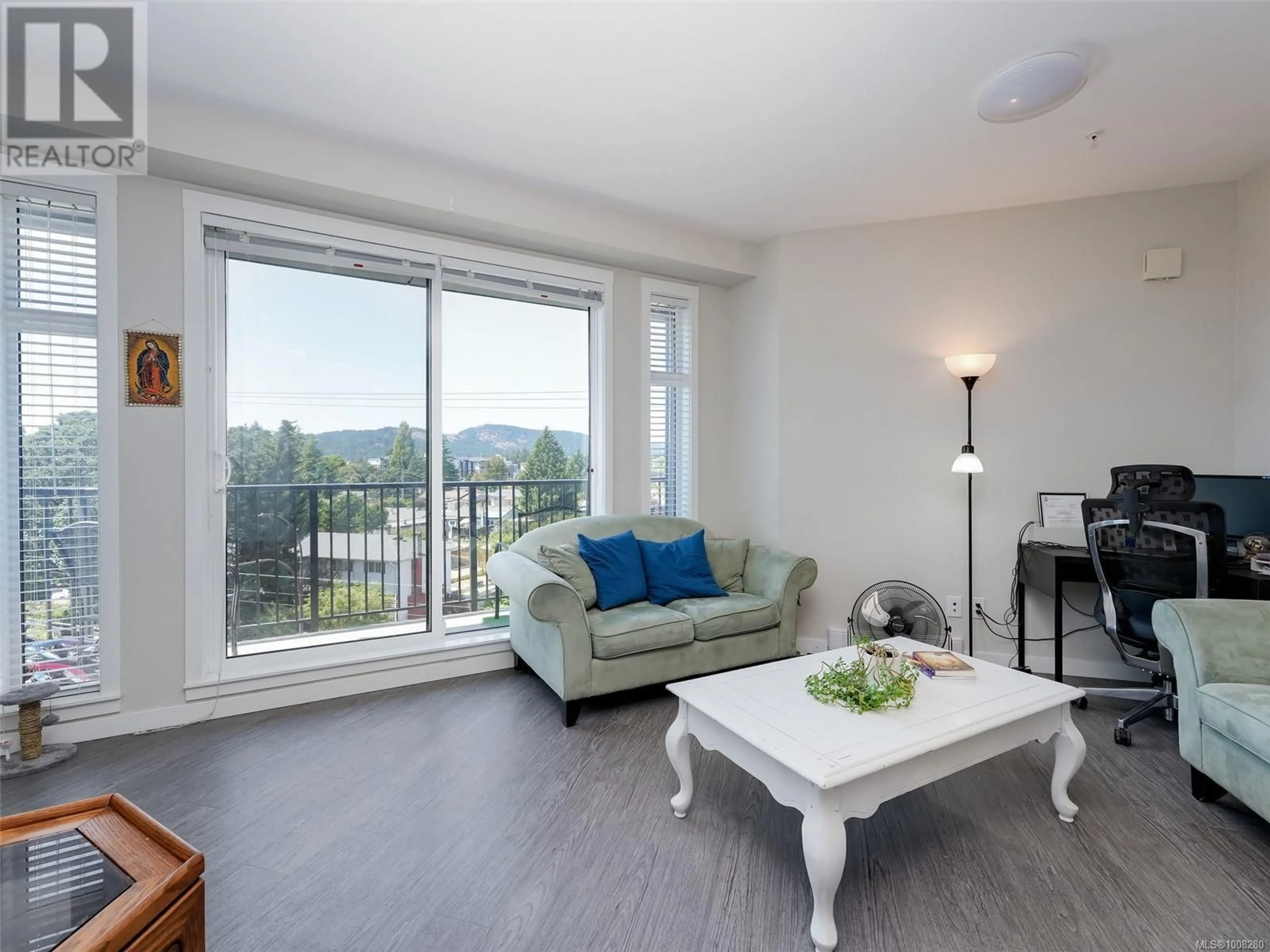 Living room with furniture, wood/laminate floor for 416 - 2843 JACKLIN ROAD, Langford British Columbia V9B4P4