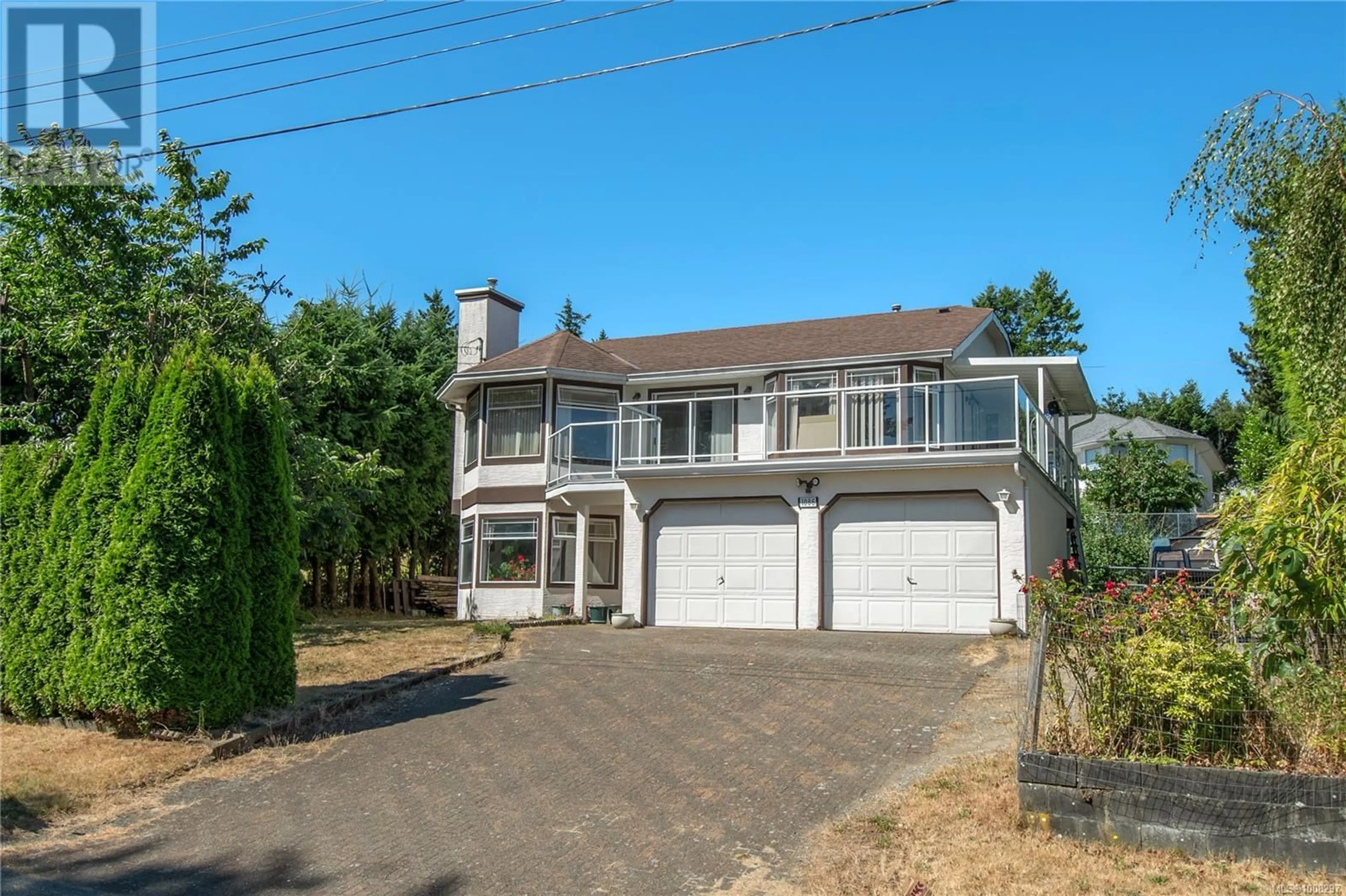Home with vinyl exterior material, street for 1086 RUBY ROAD, Campbell River British Columbia V9W1M8