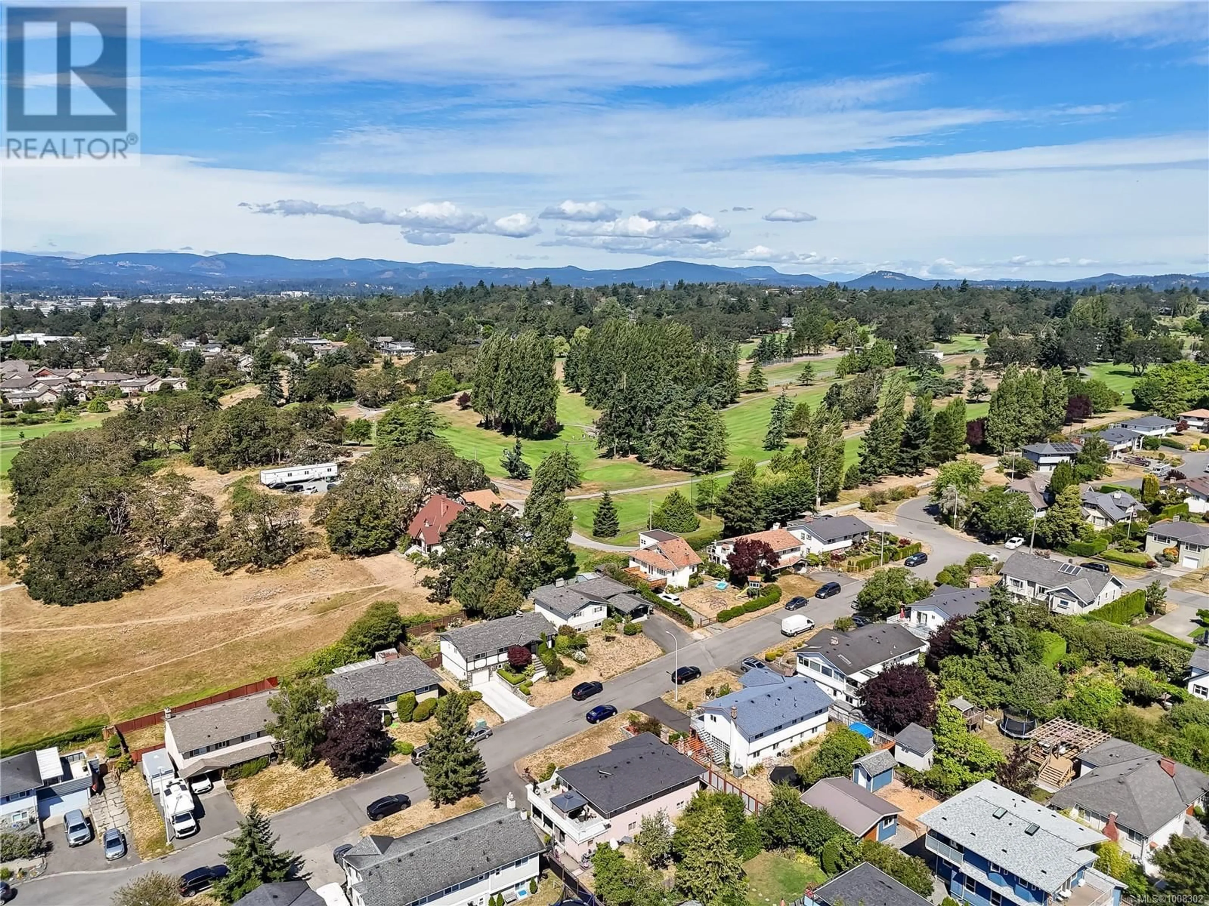 A pic from outside/outdoor area/front of a property/back of a property/a pic from drone, mountain view for 3273 MEGAW PLACE, Saanich British Columbia V8P5J7
