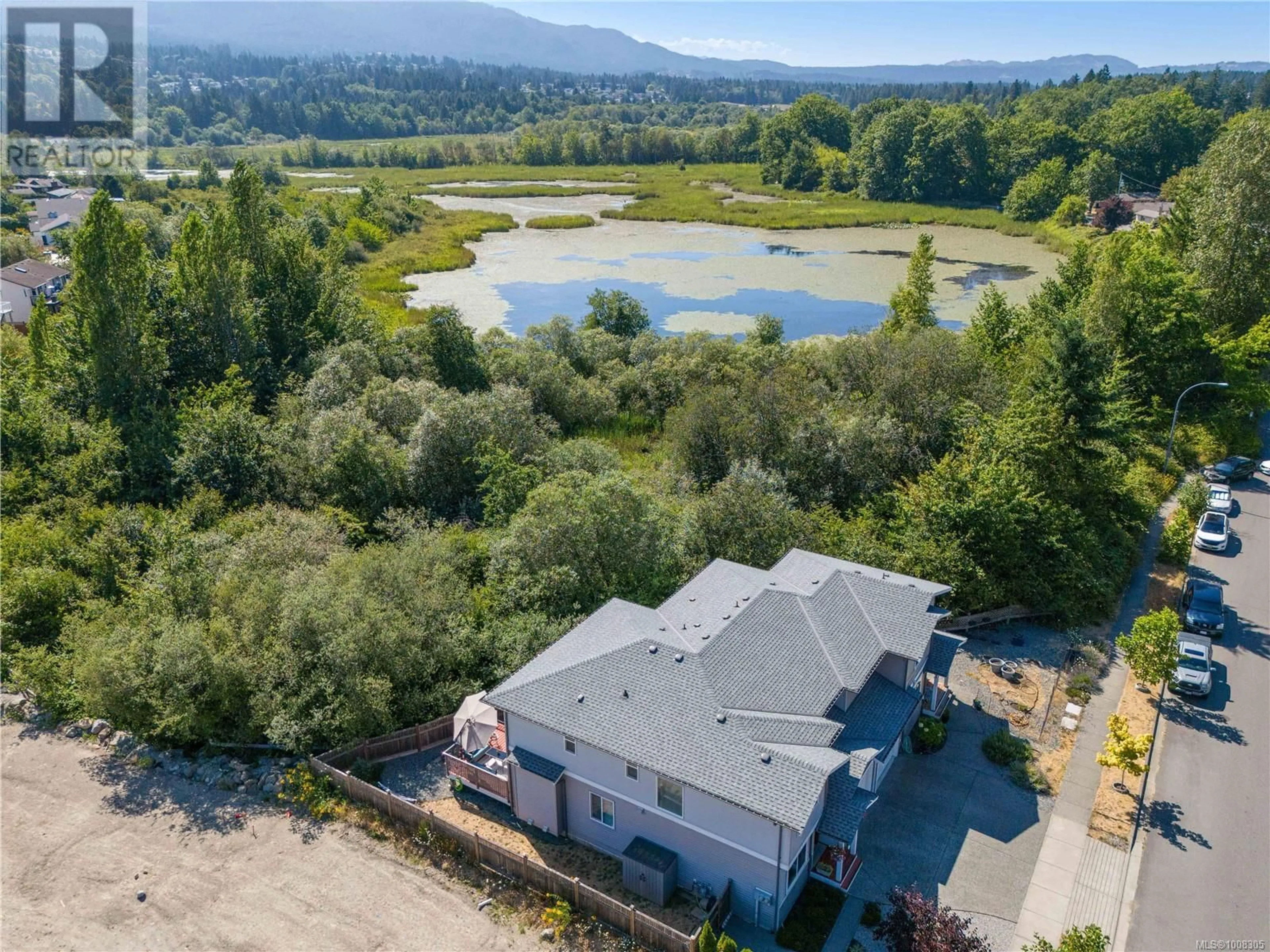 A pic from outside/outdoor area/front of a property/back of a property/a pic from drone, water/lake/river/ocean view for 495 MENZIES RIDGE DRIVE, Nanaimo British Columbia V9R0C4
