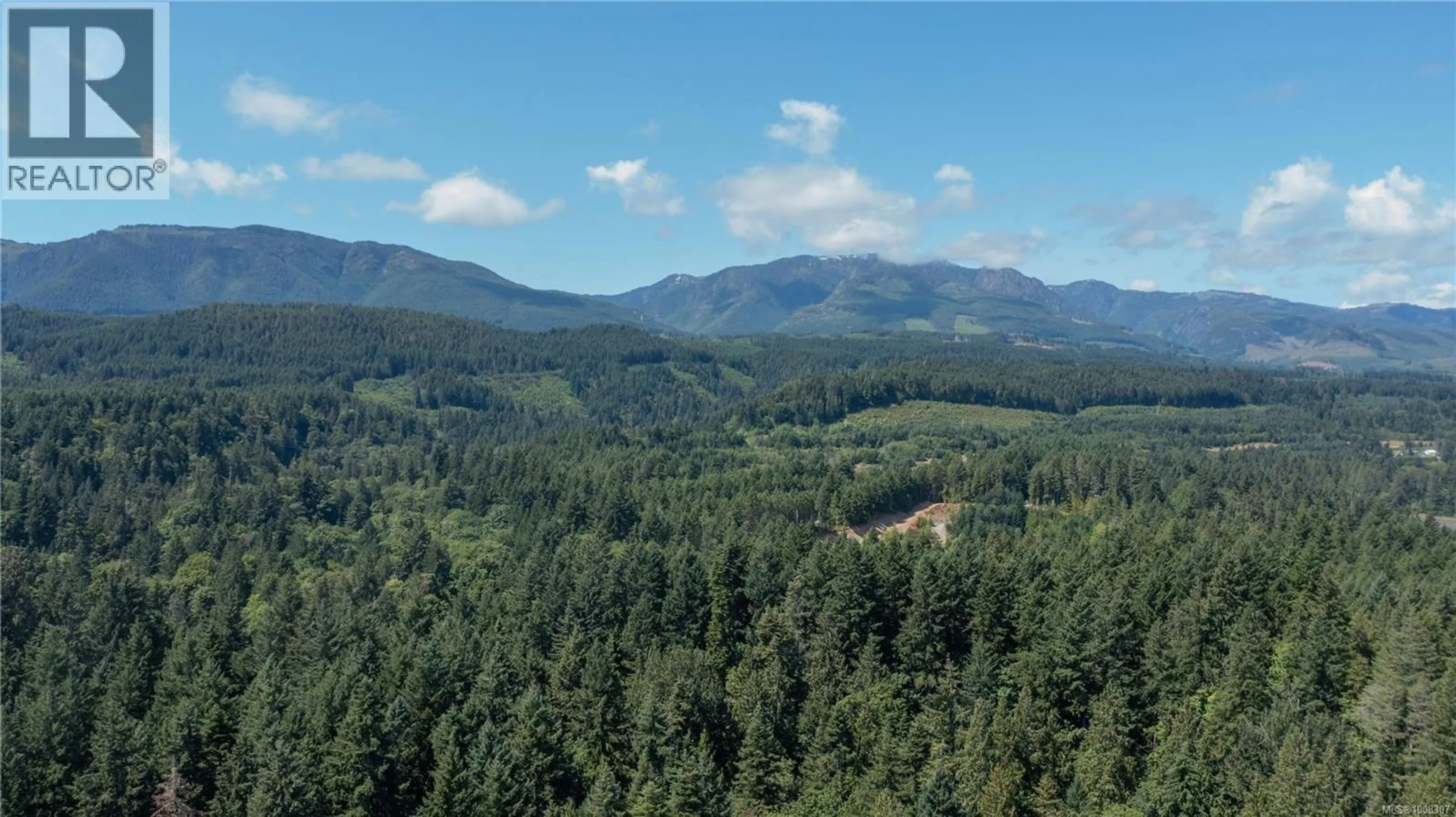 A pic from outside/outdoor area/front of a property/back of a property/a pic from drone, forest/trees view for 8450 BERRAY ROAD, Fanny Bay British Columbia V0R1W0