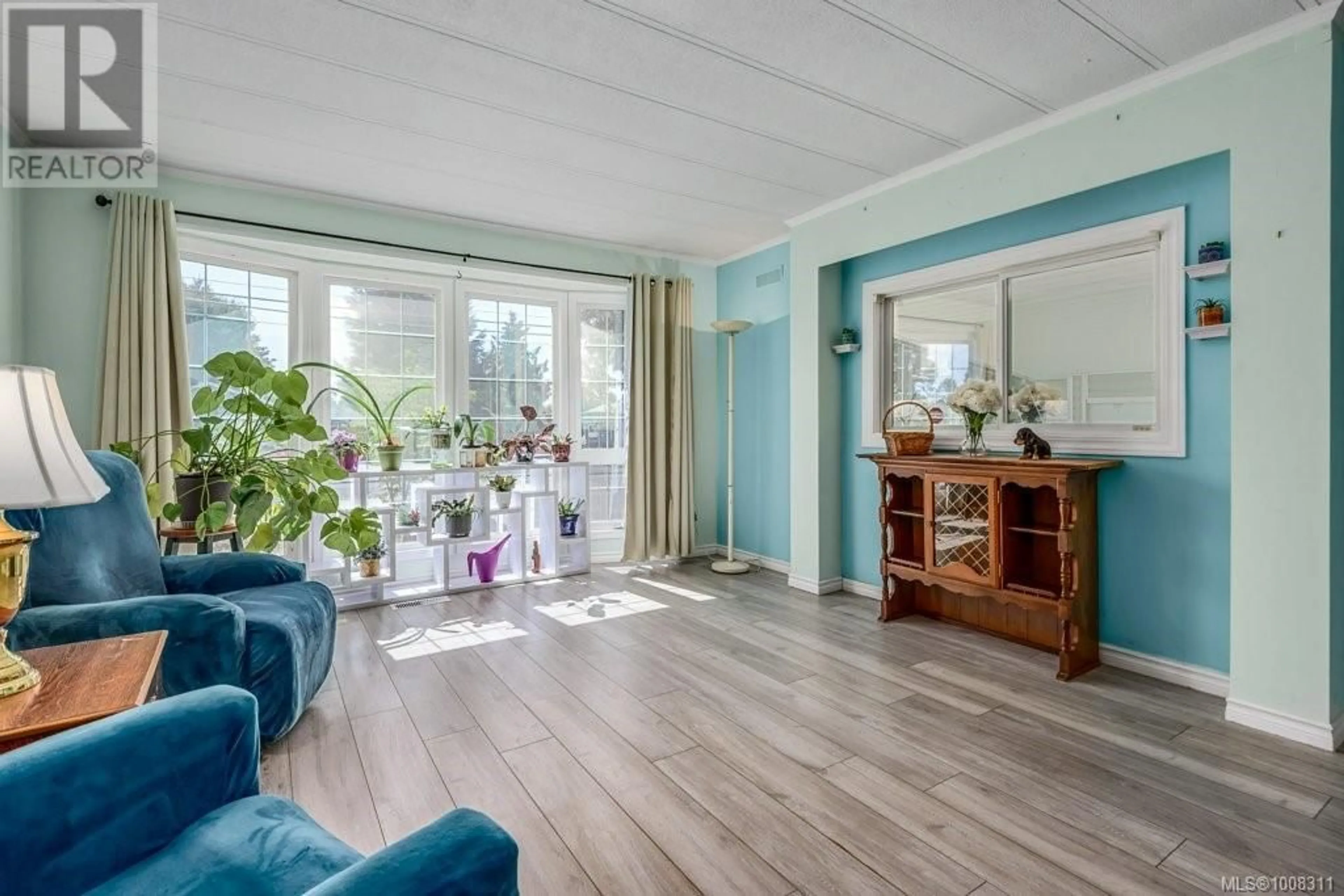 Living room with furniture, wood/laminate floor for 2340 6TH STREET EAST, Courtenay British Columbia V9N7R9